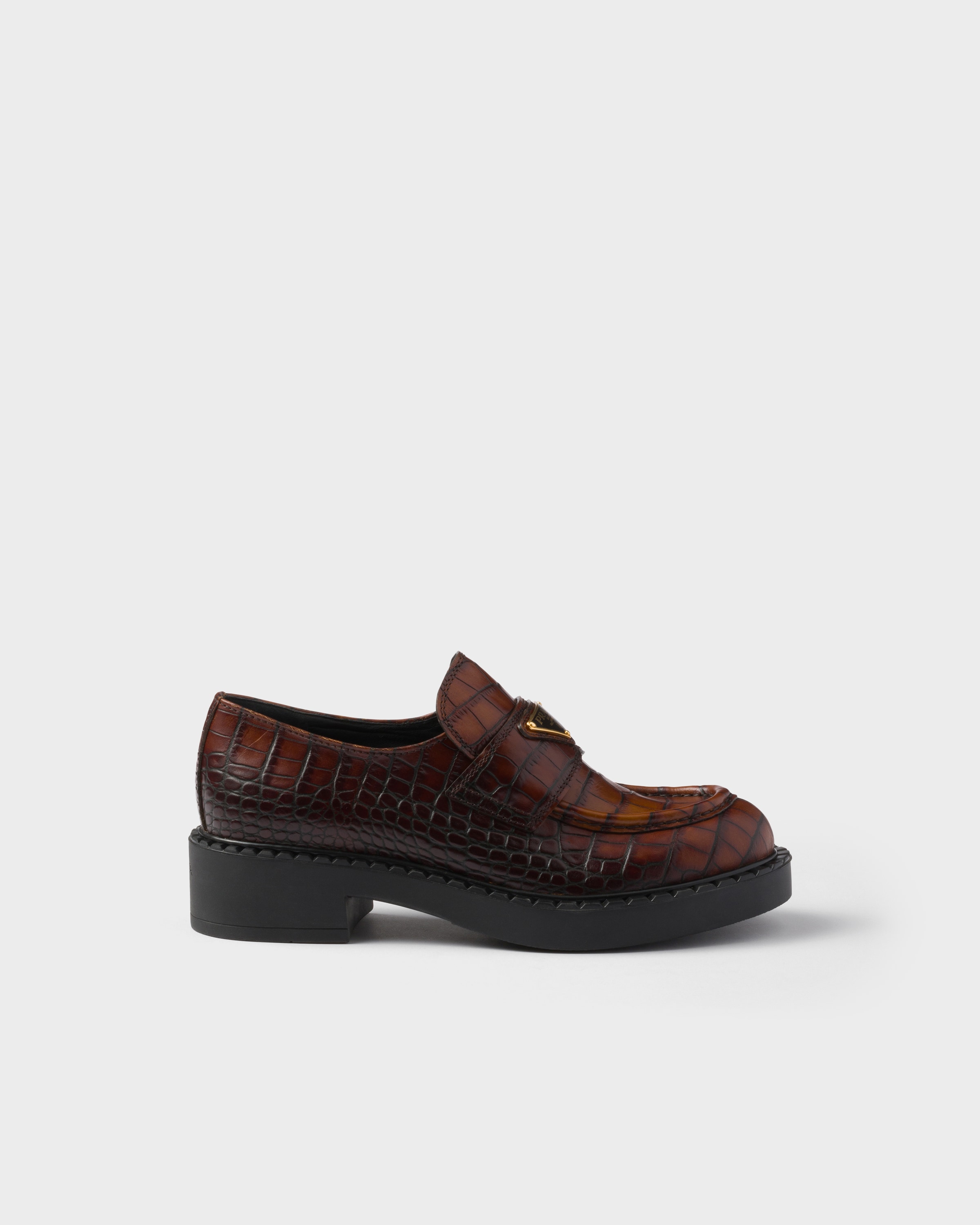 Chocolate crocodile-print leather loafers
