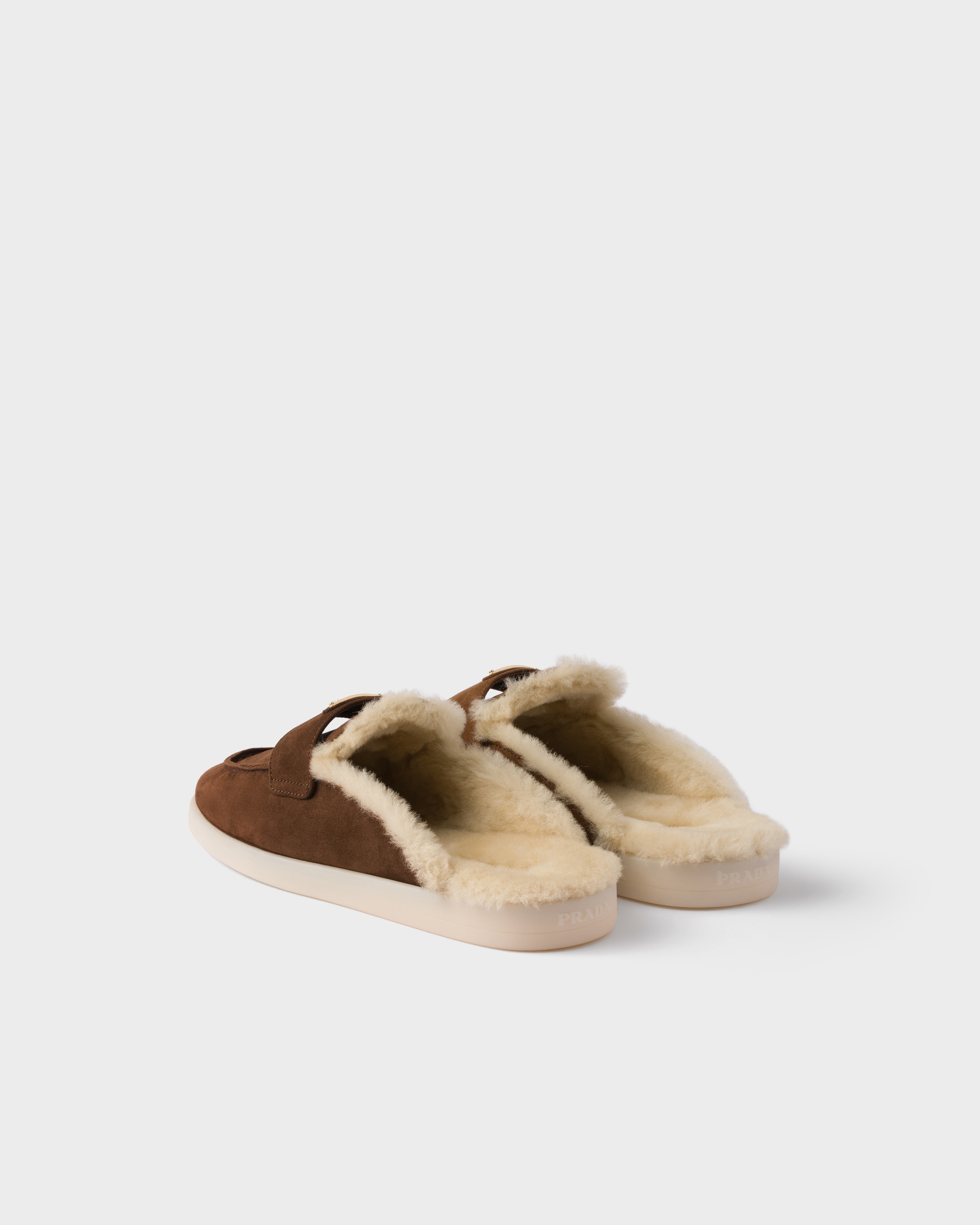 Prada Suede And Shearling Mules In Yellow