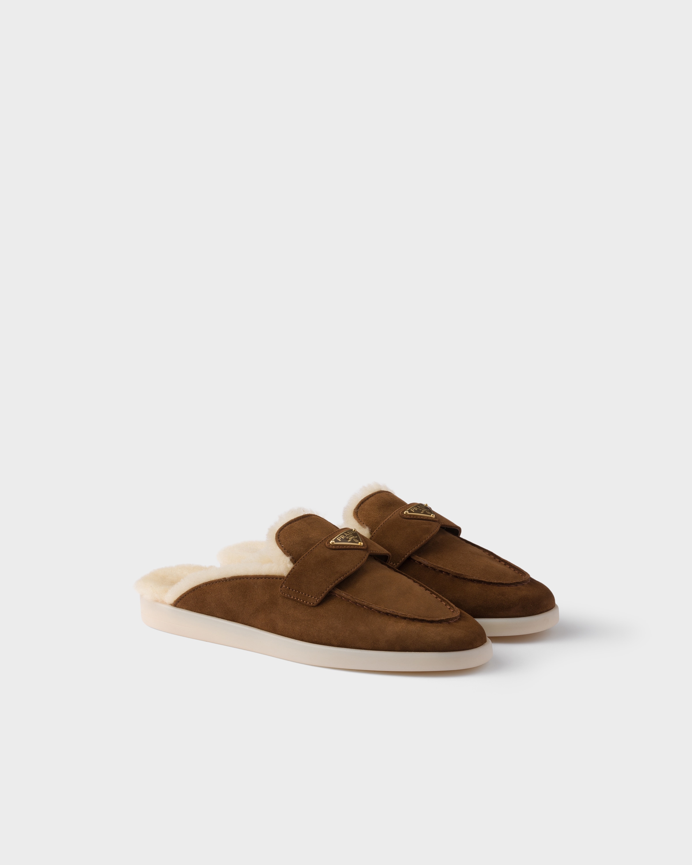 Prada Suede And Shearling Mules In Yellow