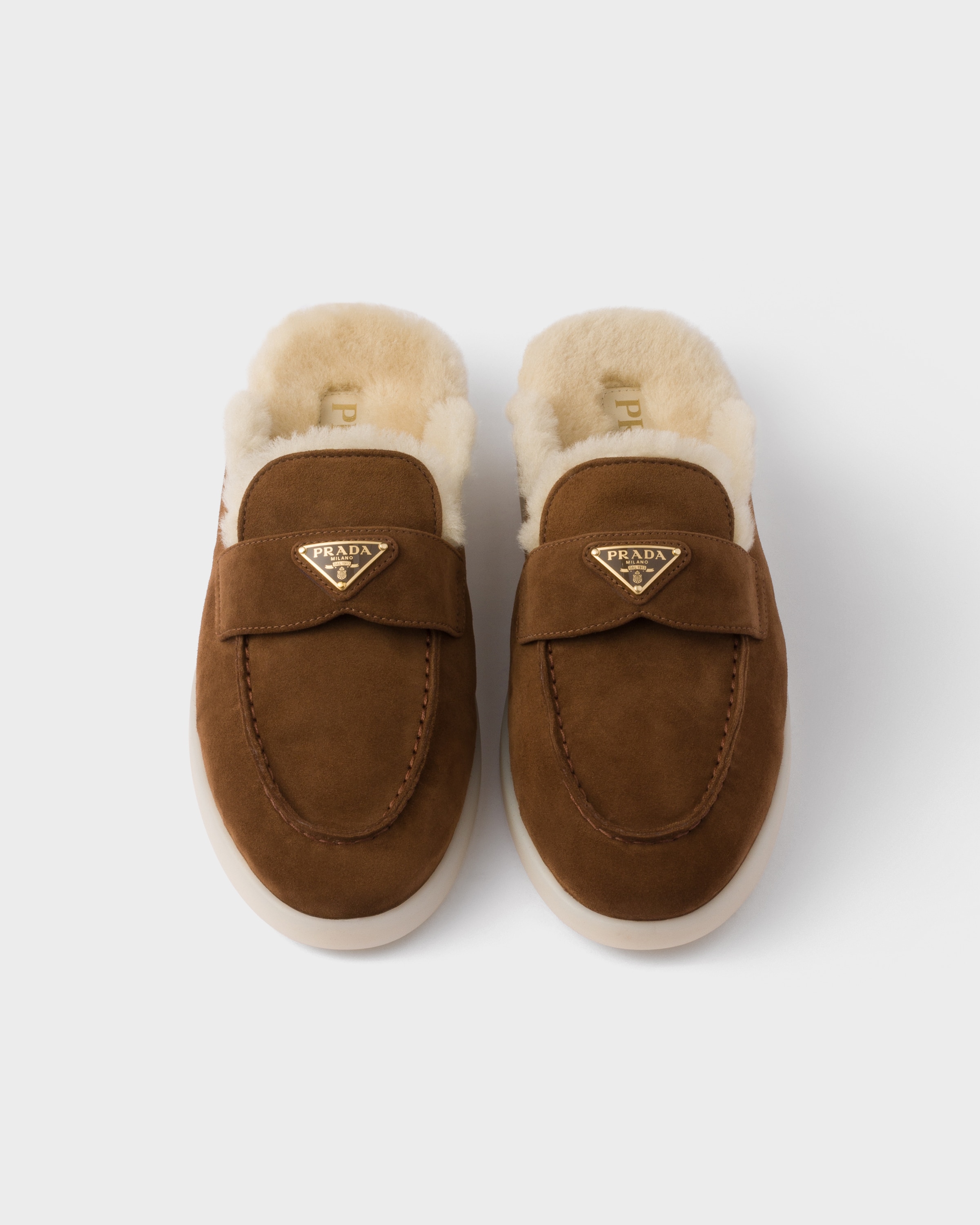 Prada Suede And Shearling Mules In Yellow