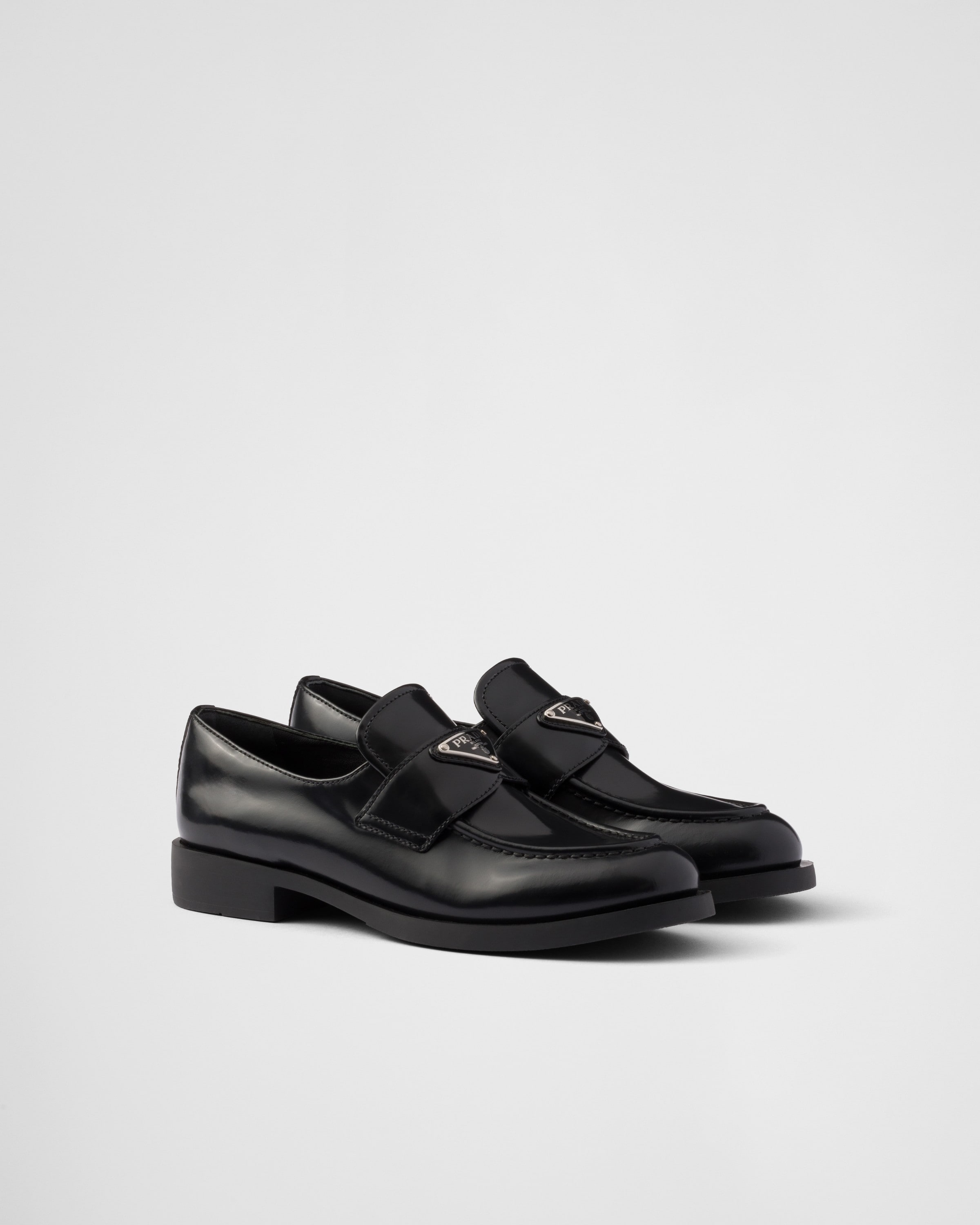 Prada Brushed Black Calf Leather Loafers With Enameled Logo