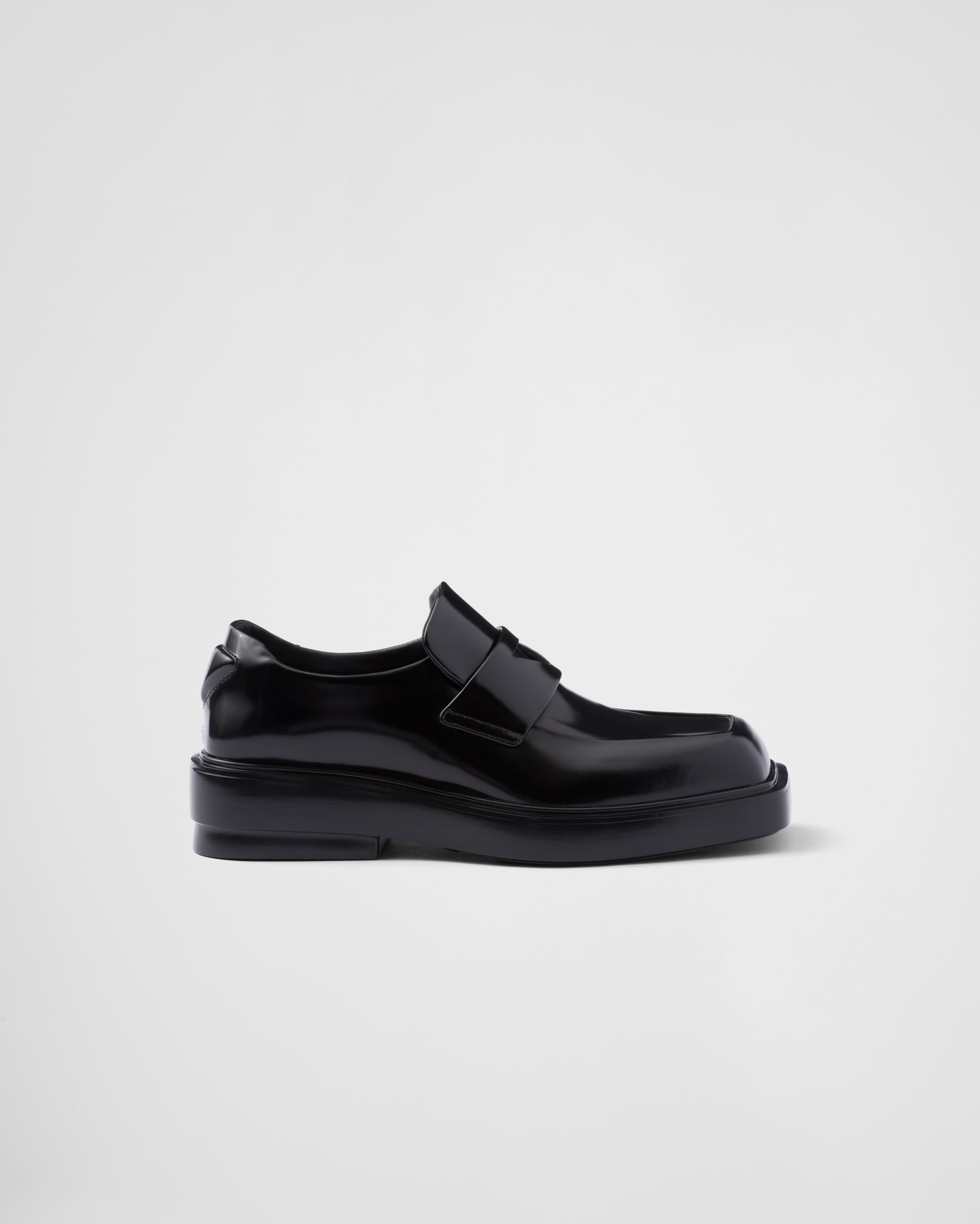 Shop Prada Brushed Leather Loafers In Black