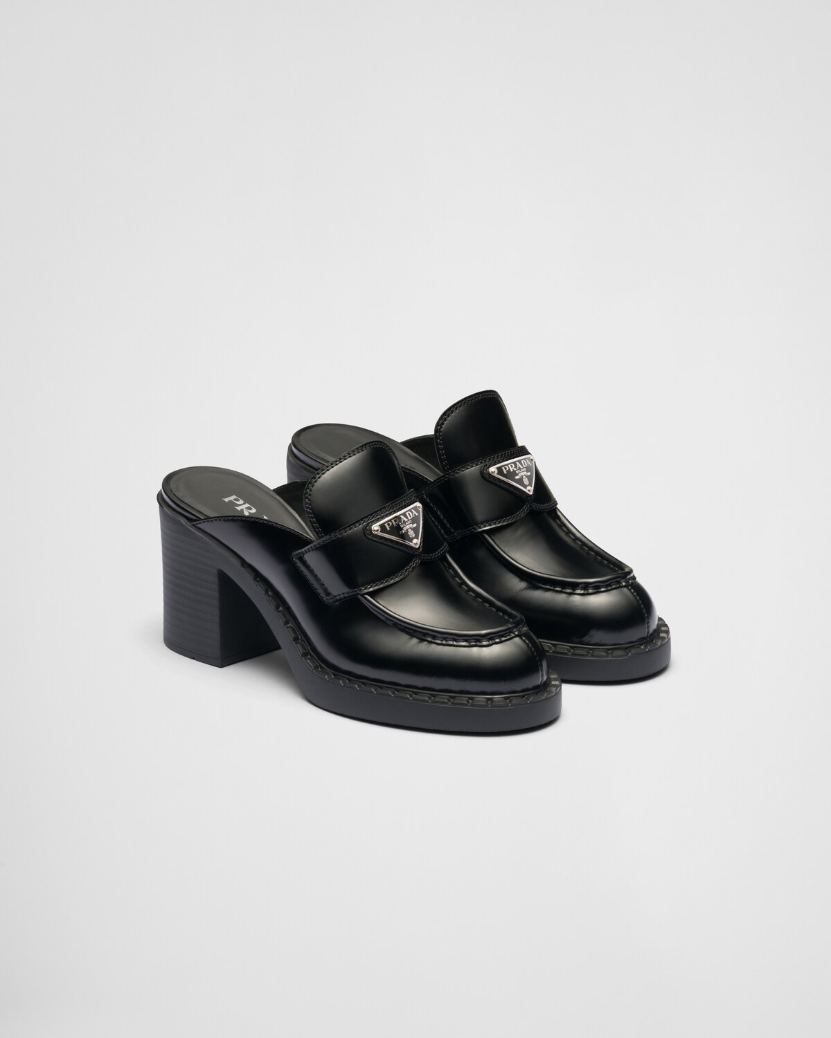 PRADA 25S BRAIDED DETAIL MULES 85MM IN WHITE CALFSKIN