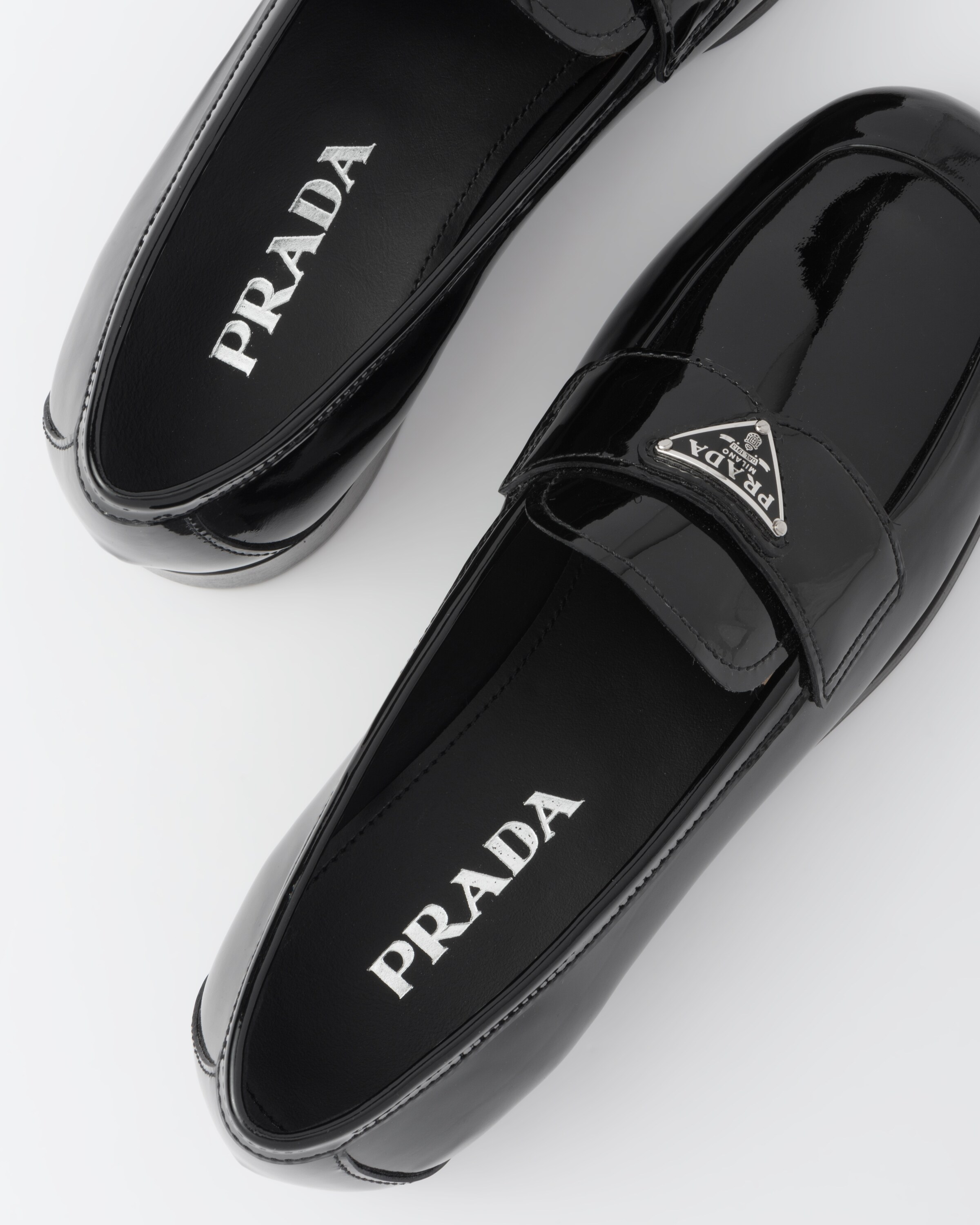 Logo Patent Leather Loafers in Black - Prada