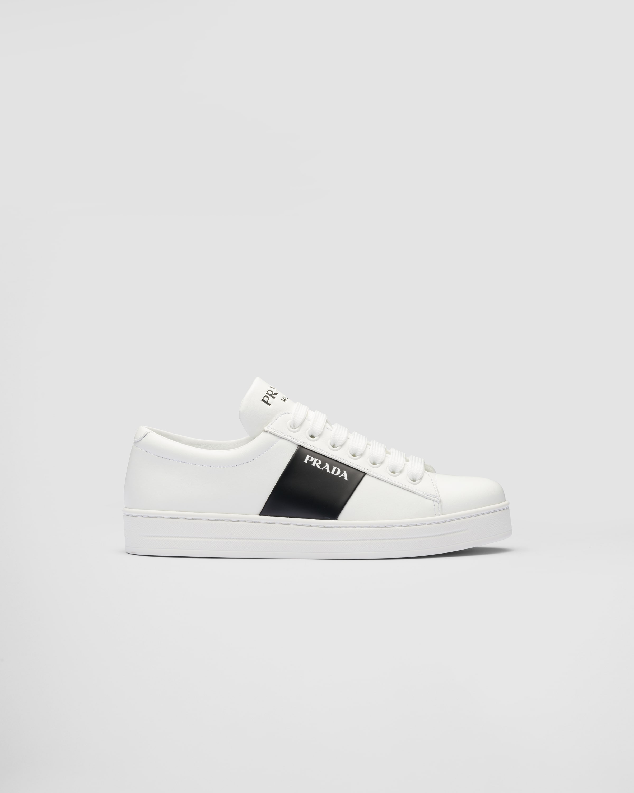Ladies white 2025 prada trainers