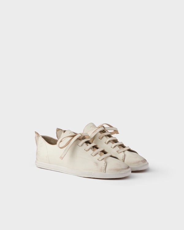Chalk White Antiqued leather sneakers | PRADA