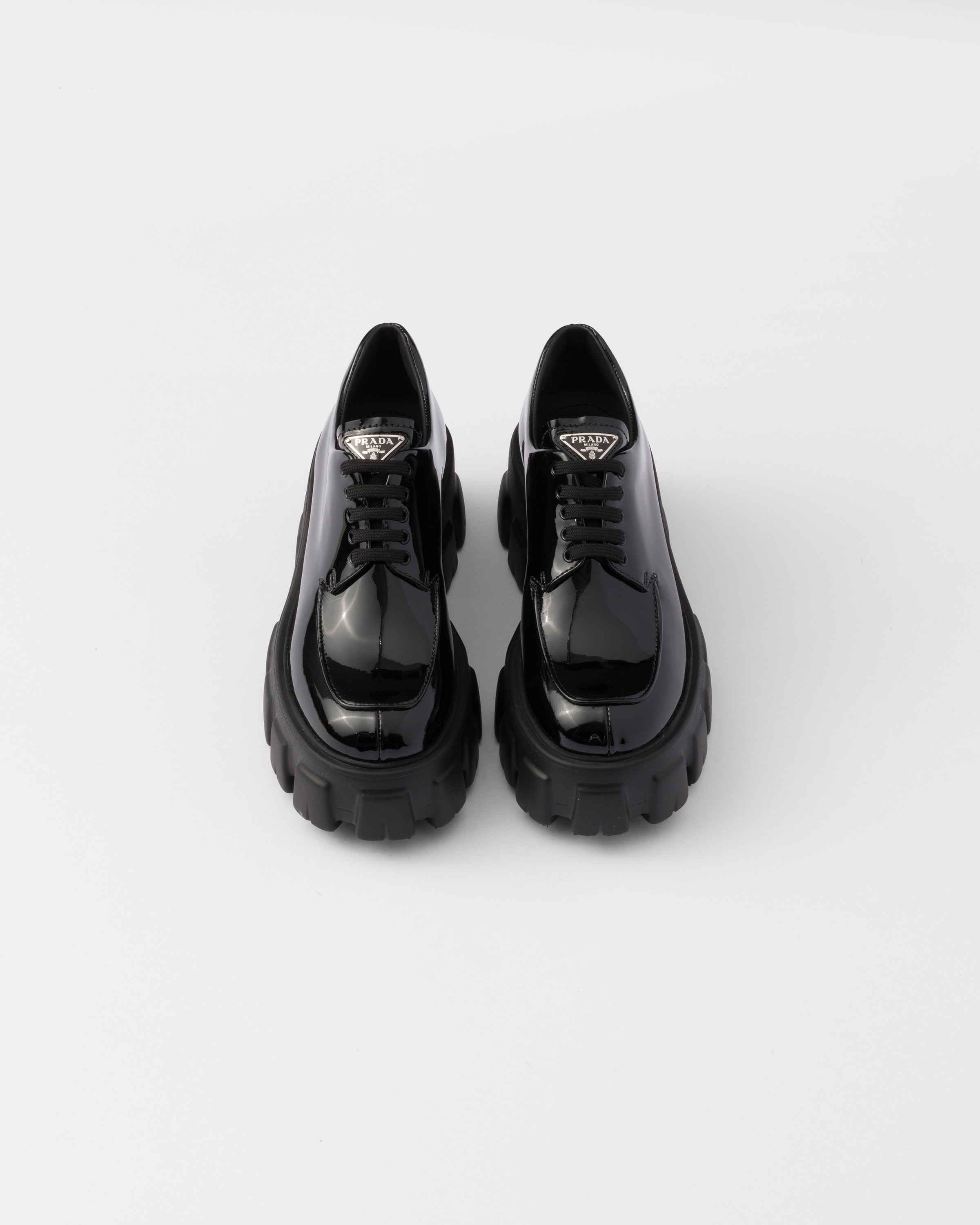 Black Monolith patent leather lace-up shoes | PRADA