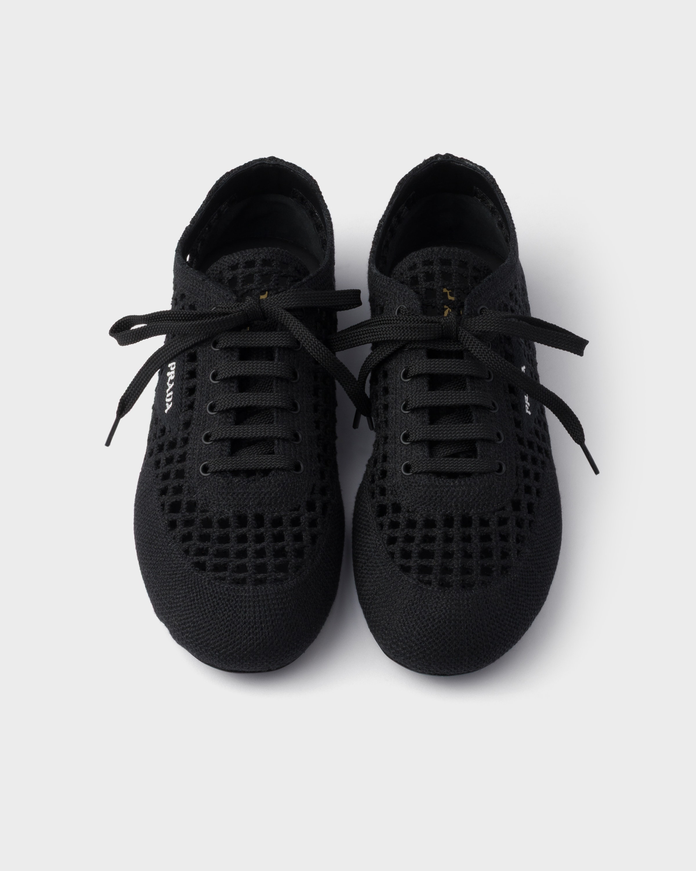 Black Collapse crochet laced sneakers | PRADA