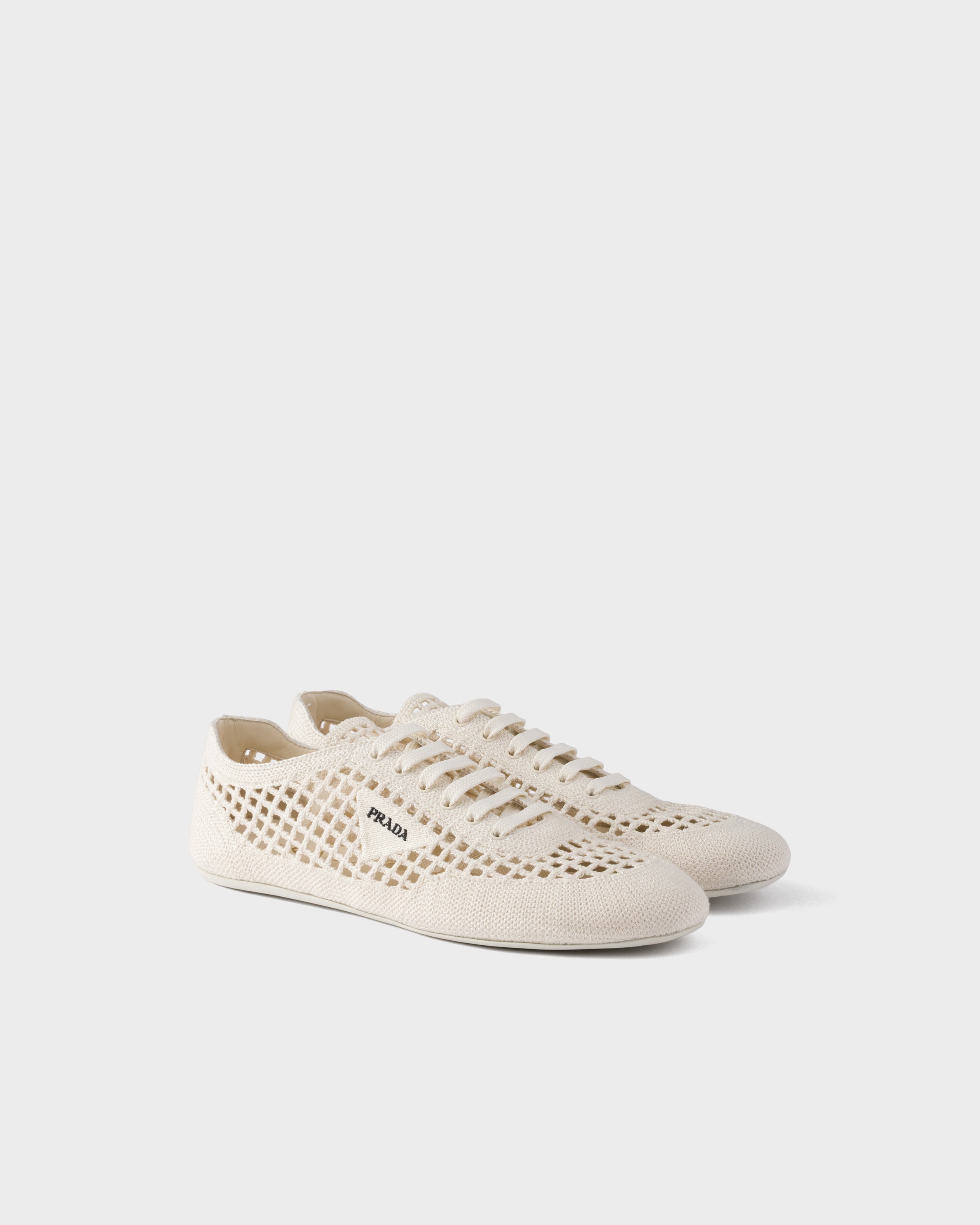 Ivory Collapse crochet laced sneakers | PRADA - United States