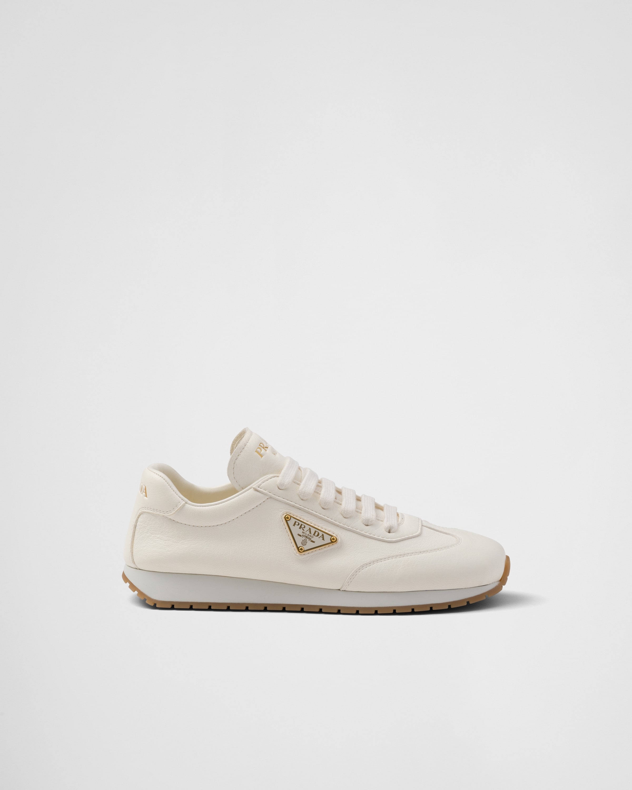 Shop Prada Leather Sneakers In Ivory