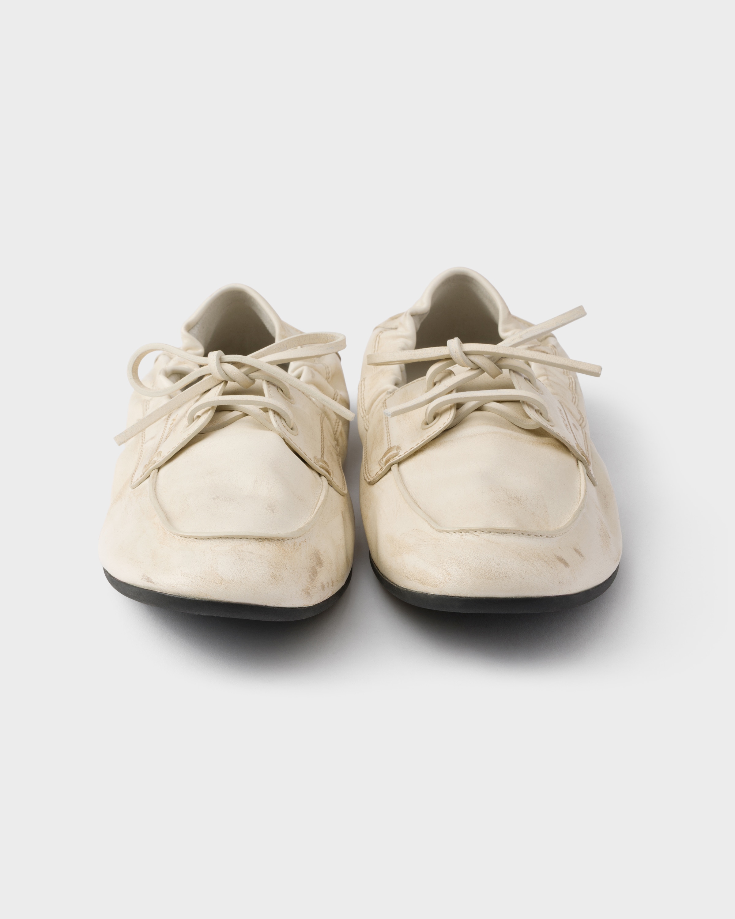 Chalk White Shuffle antiqued leather boat shoes | PRADA - Brazil