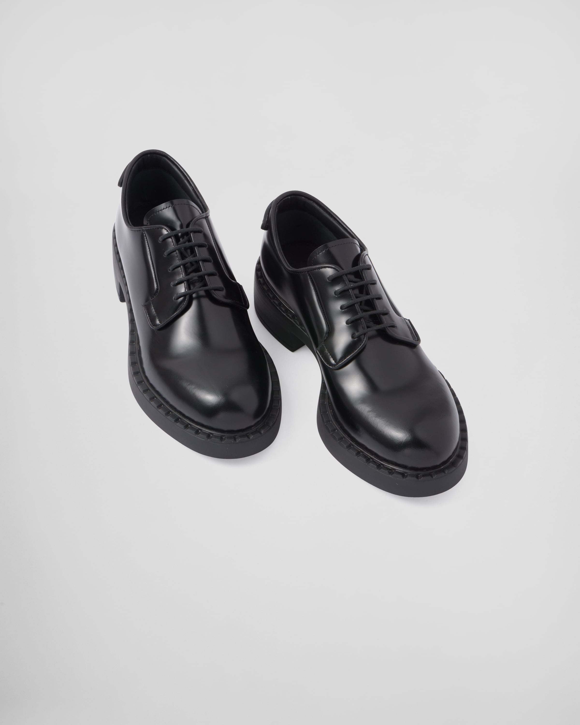 Black Brushed-leather derby shoes | Prada