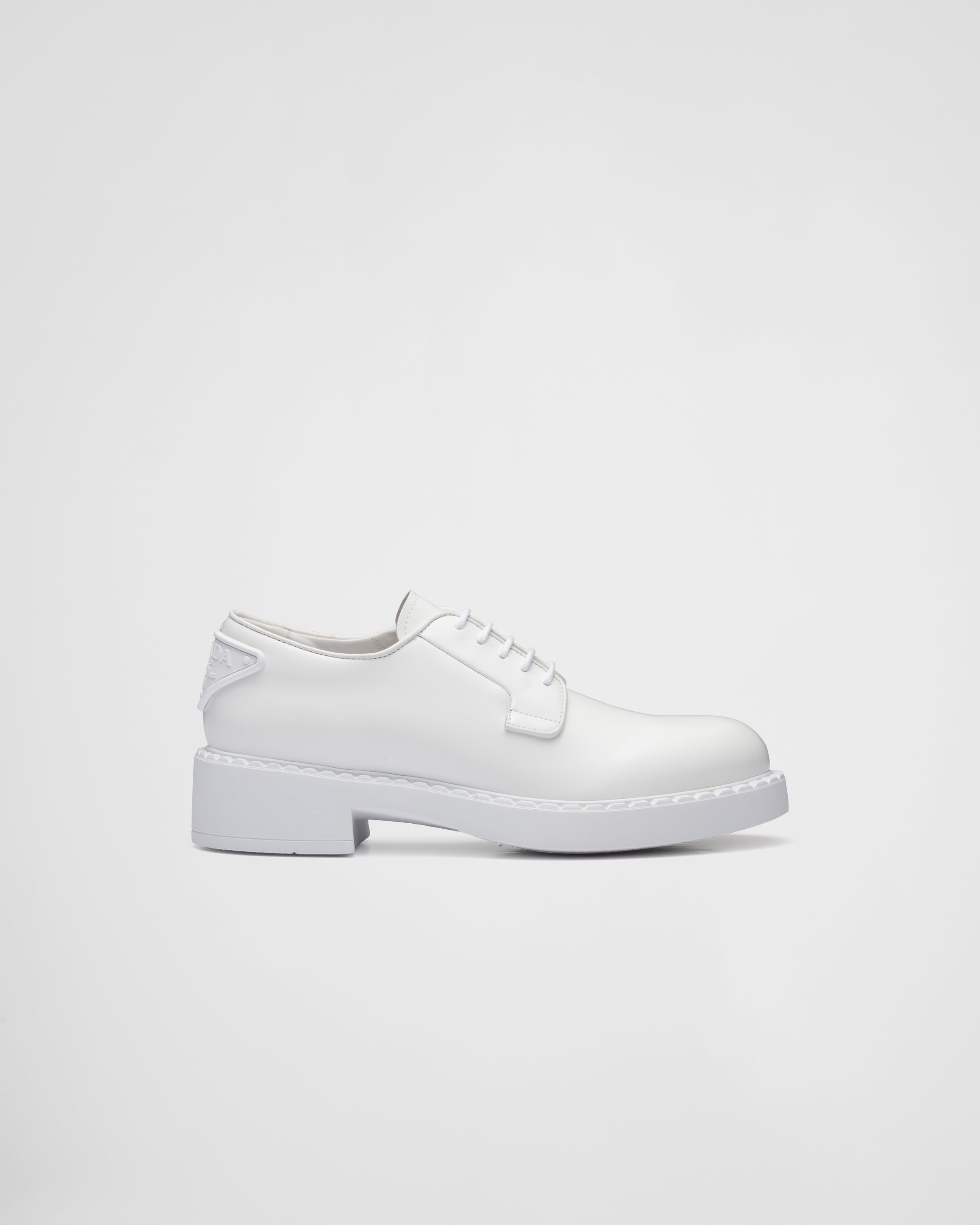 White Brushed-leather derby shoes | Prada