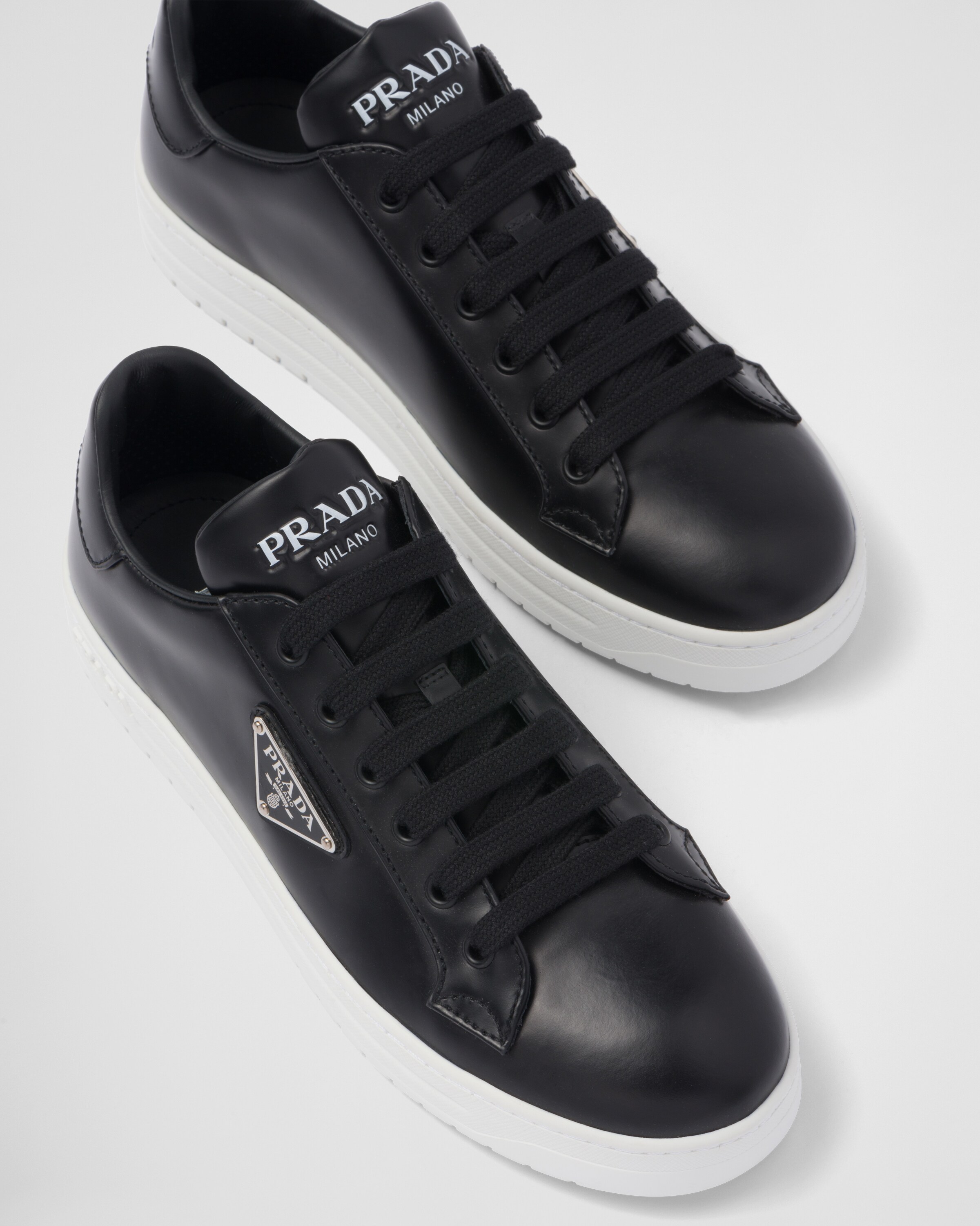 Black/white Downtown brushed leather sneakers | Prada