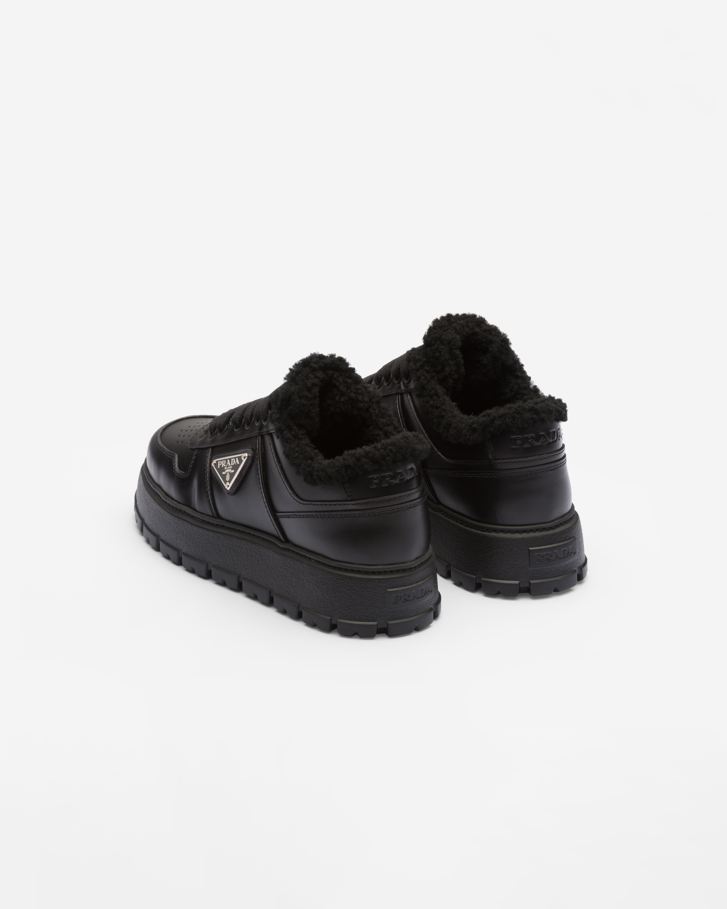 Leather and shearling sneakers