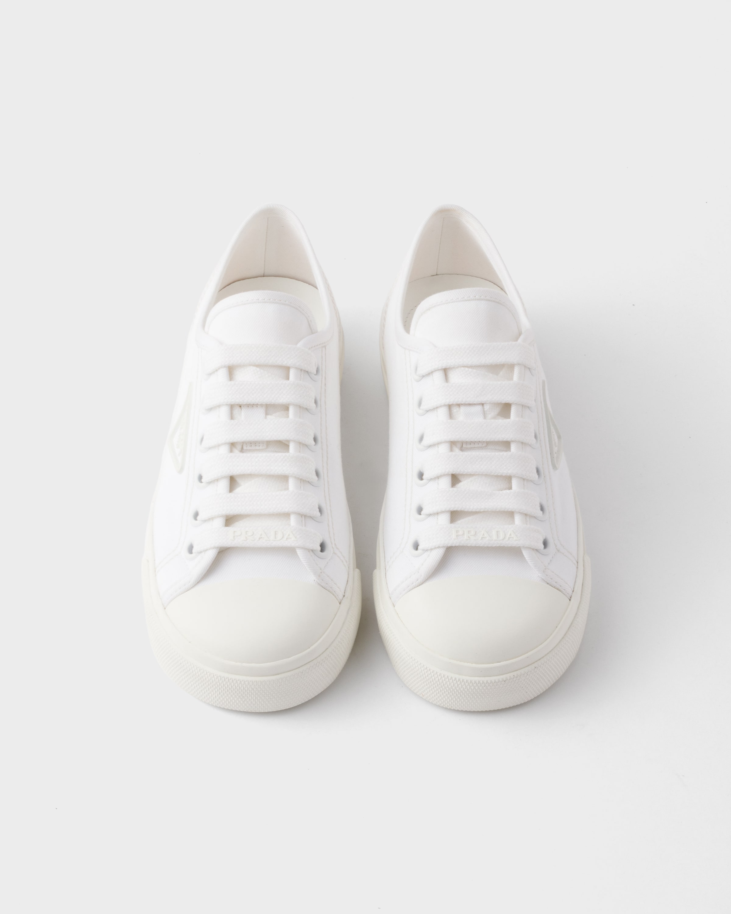 Prada Naplak Leather Sneakers In Weiss