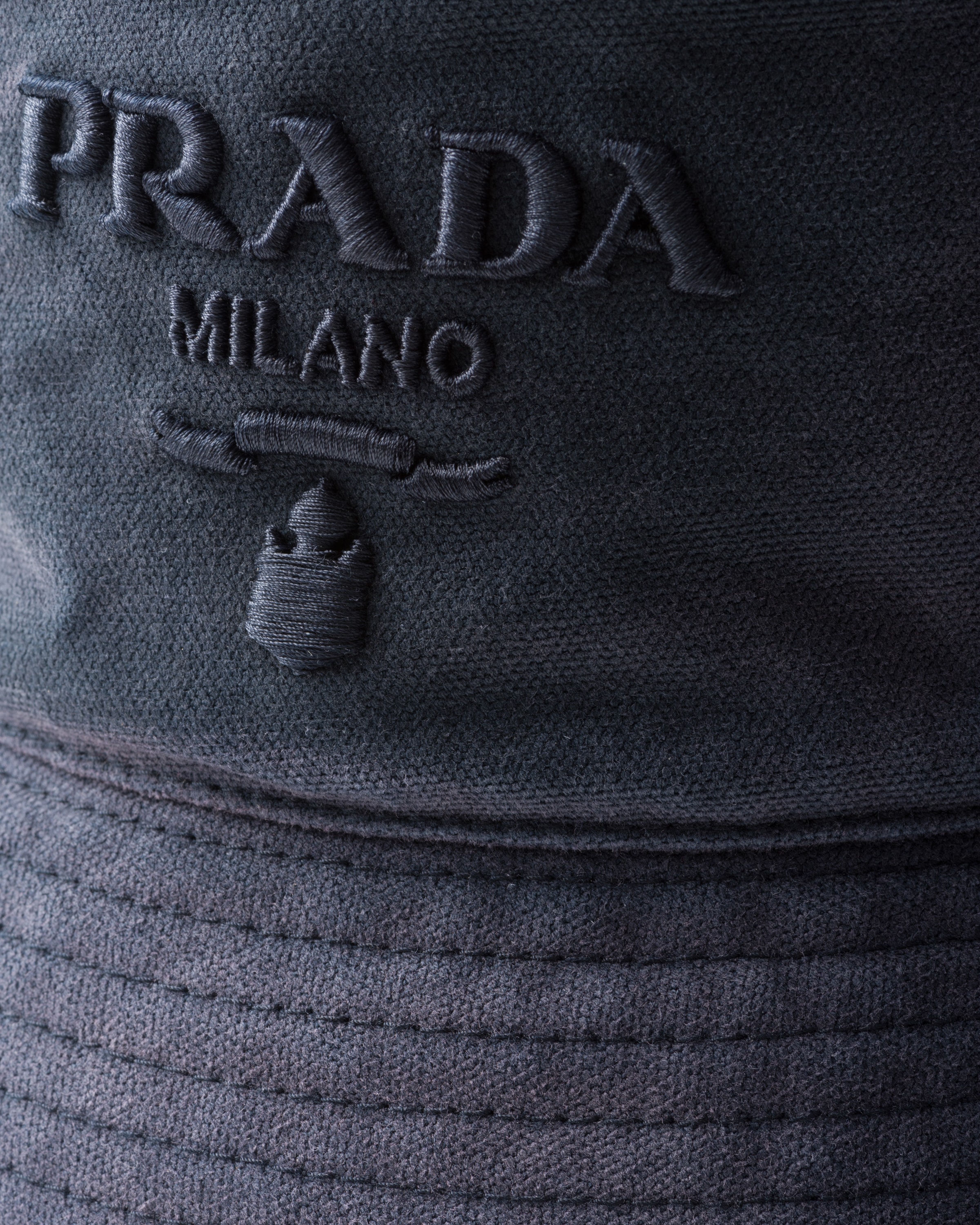 Prada Logo Embroidered Bucket Hat In Baltic Blue
