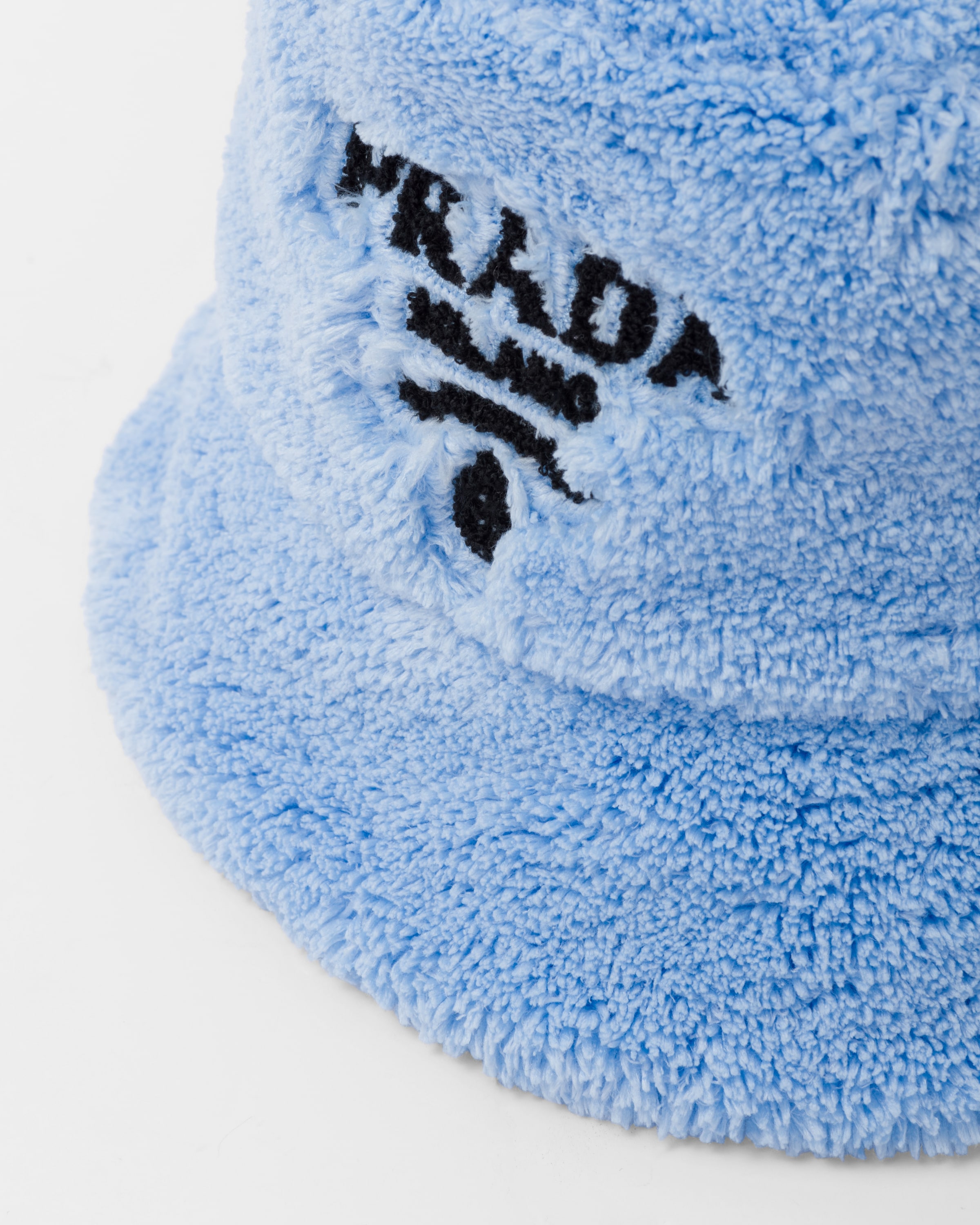 Actualizar 32+ imagen prada terry cloth bucket hat Abzlocal.mx