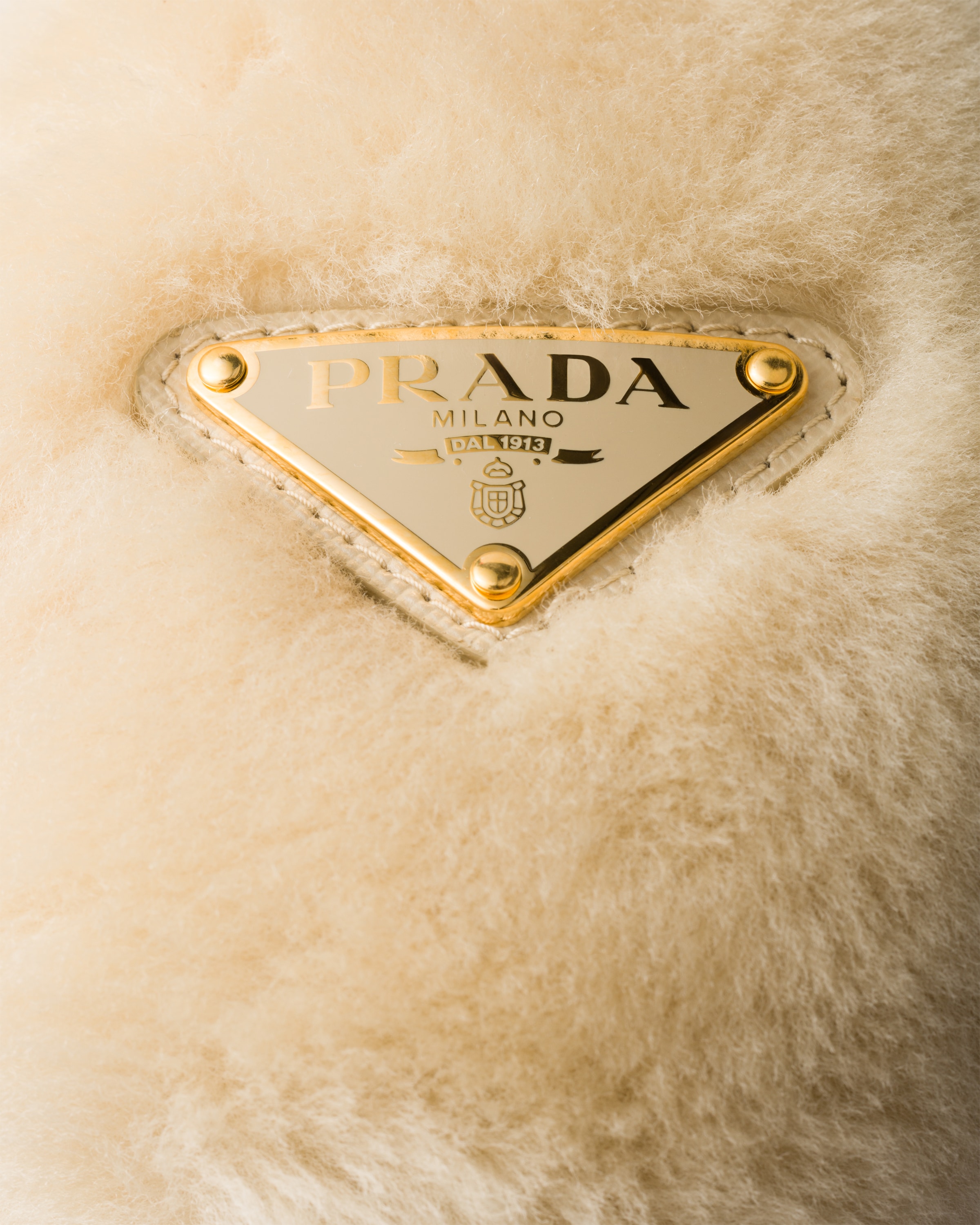 Prada Shearling Earmuffs In Ecru