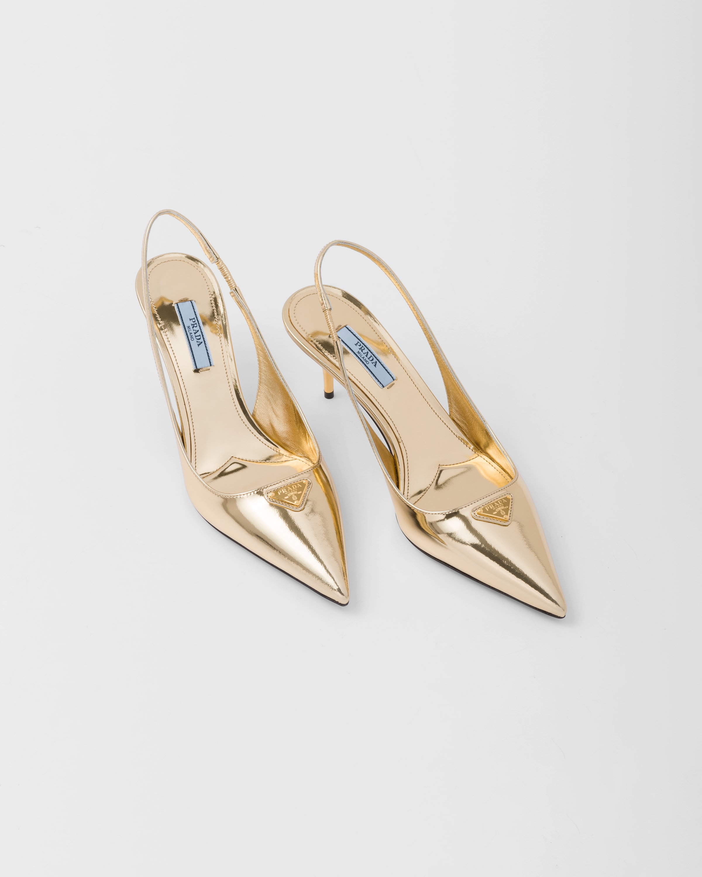 Platinum Metallic leather slingback pumps | Prada