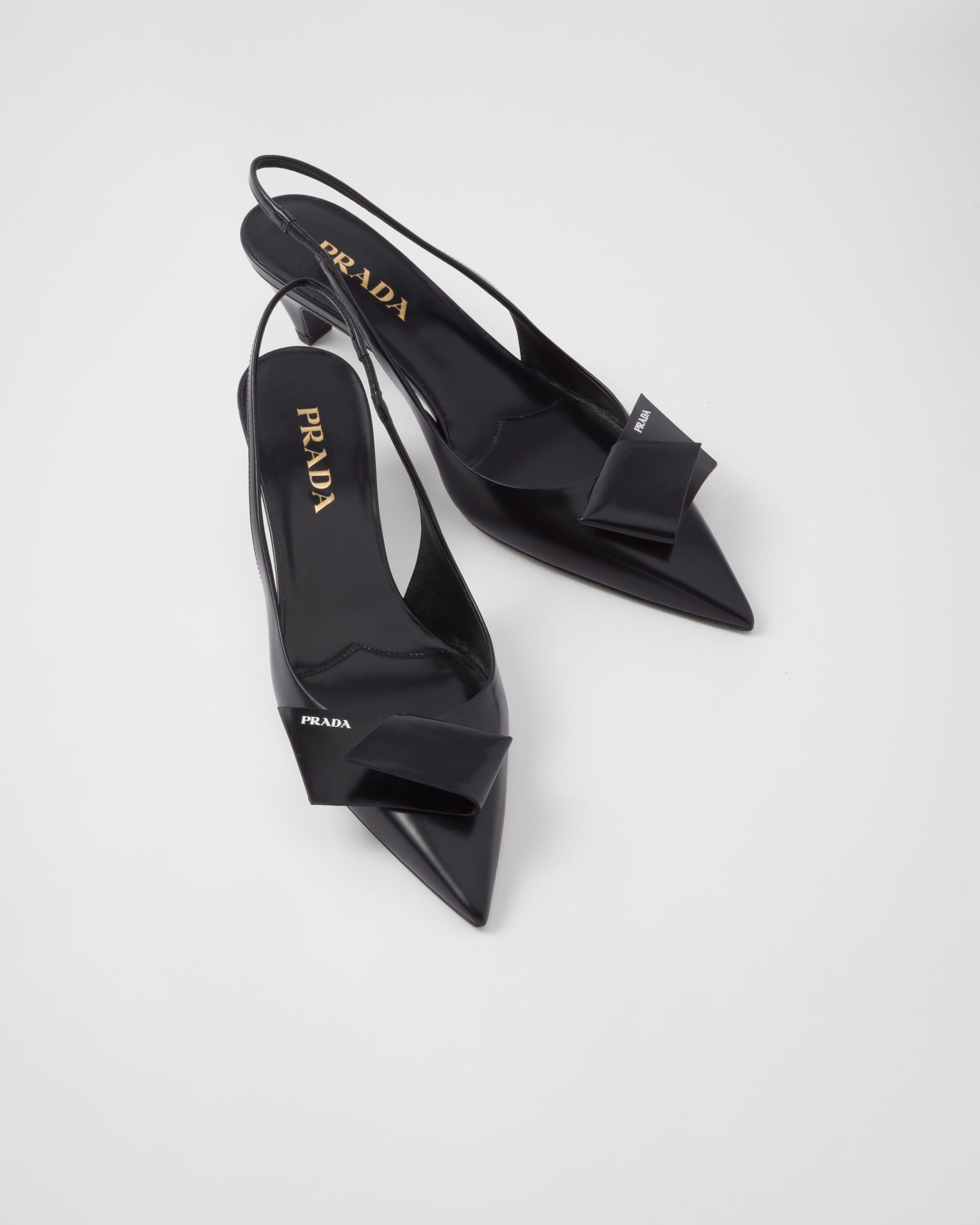 Prada logo bow pointy toe pump sales