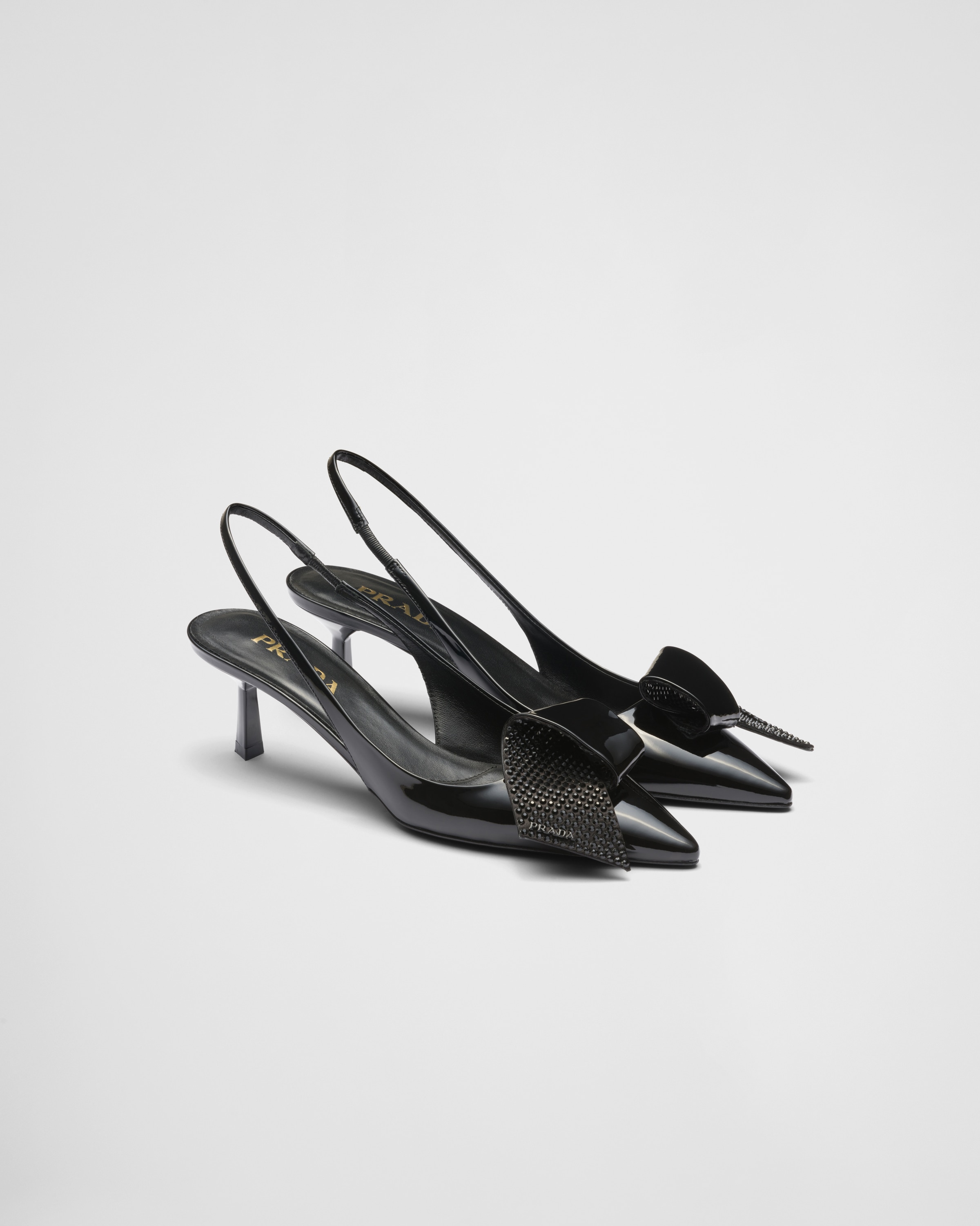 Prada Patent Leather Slingback Pumps In Black