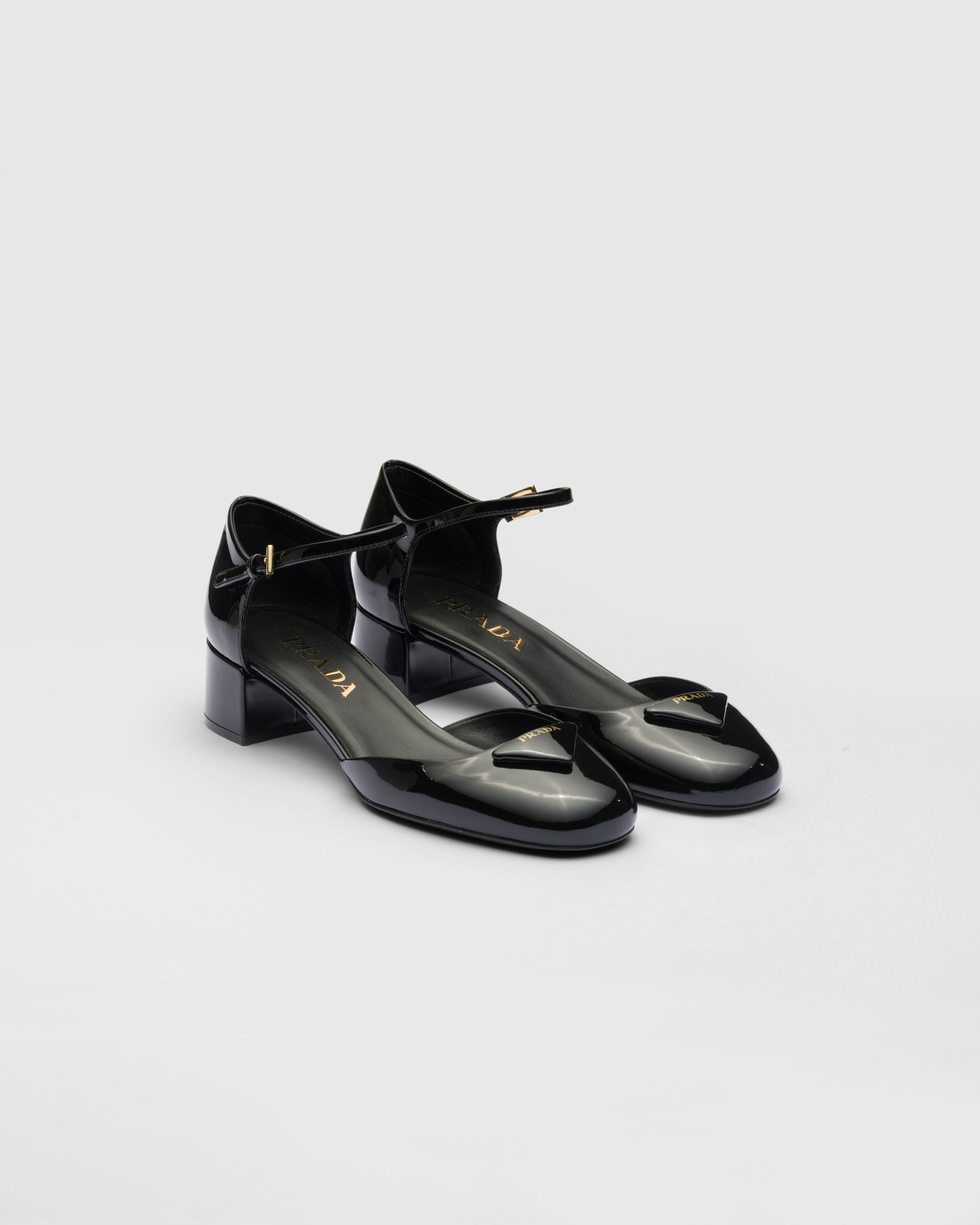 Prada patent leather clearance pumps