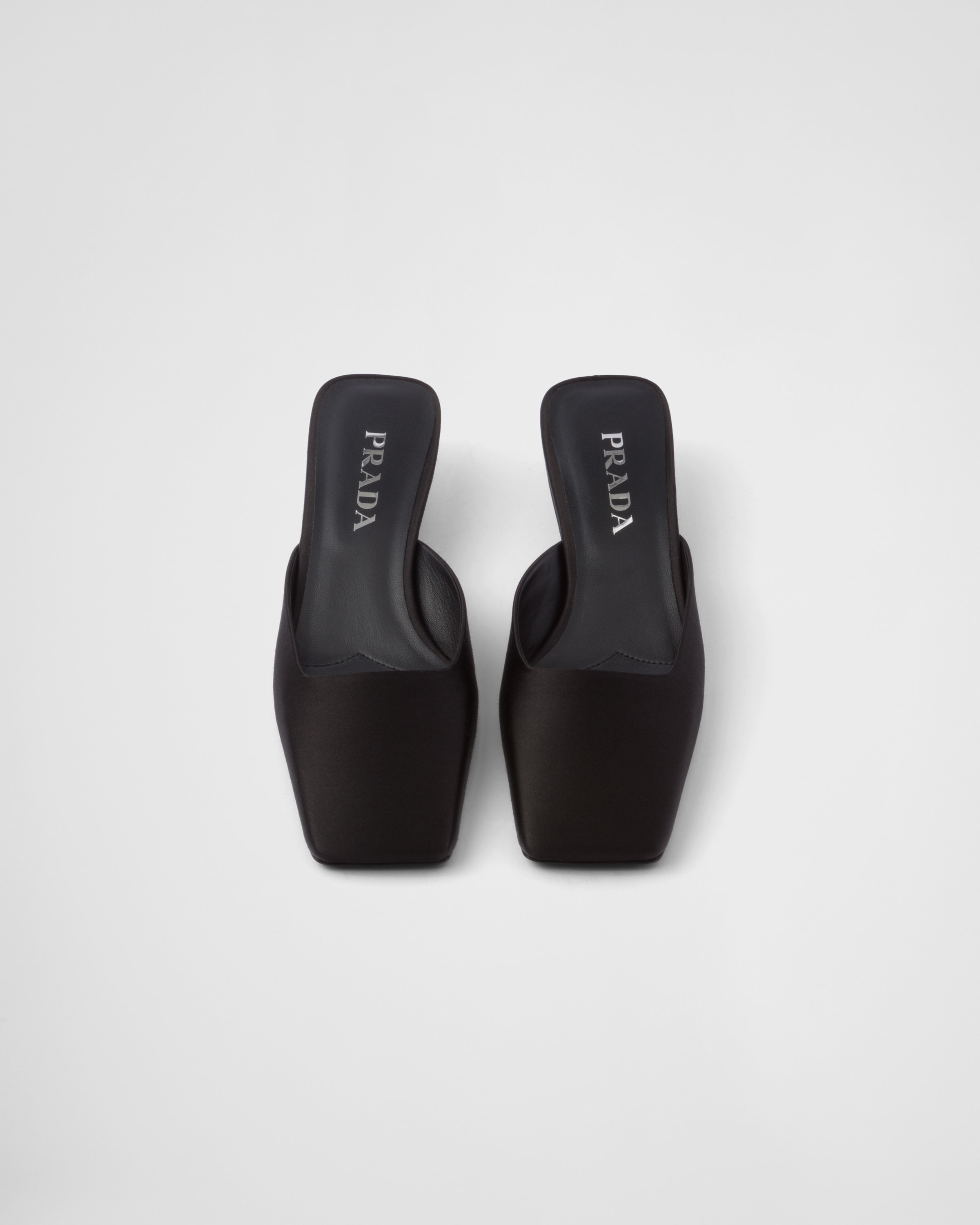 Shop Prada Satin Mules In Black