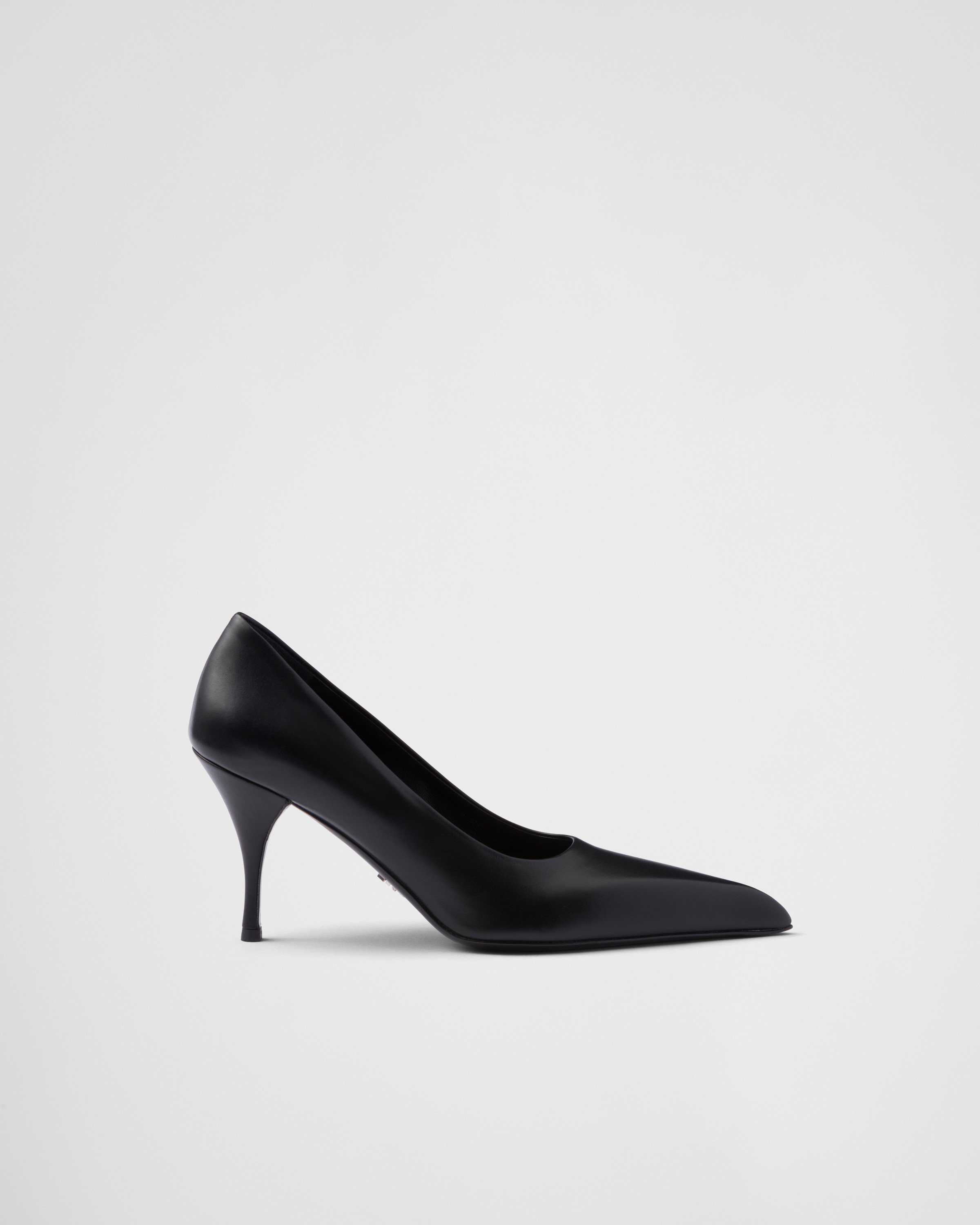 Shop Prada Leather Pumps In Black