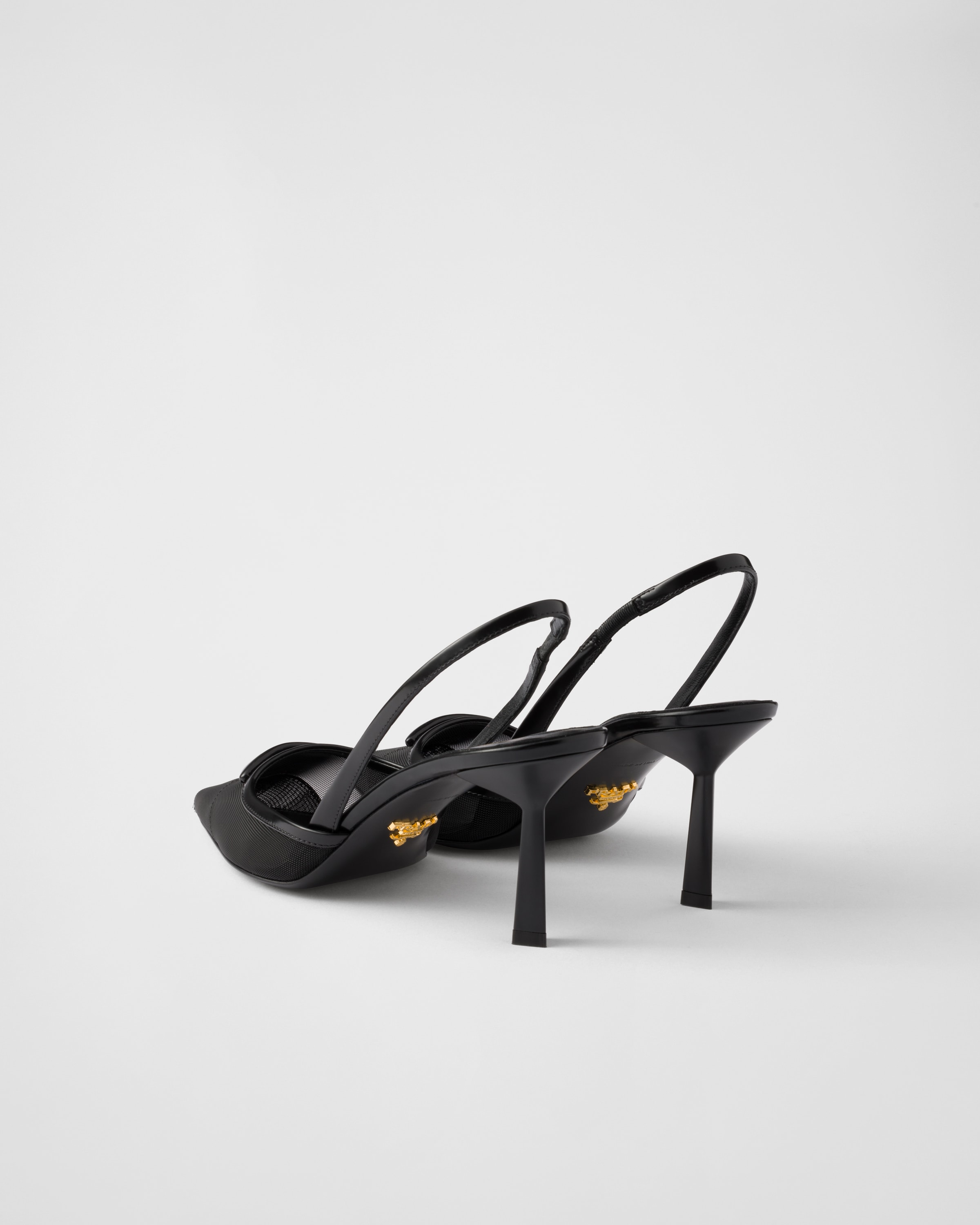 Prada 75 Logo Leather-trimmed Slingback Pumps In Black