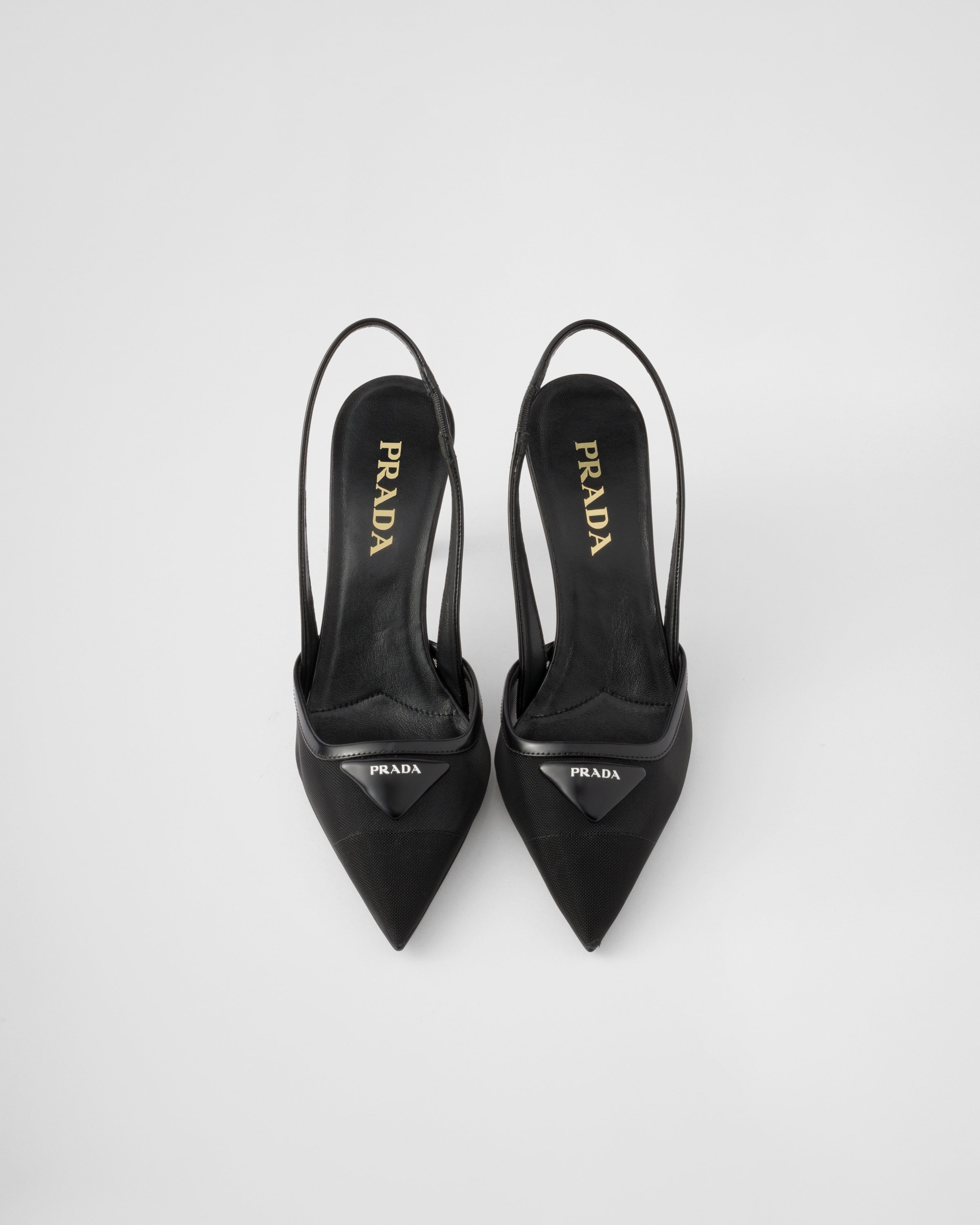 Prada 75 Logo Leather-trimmed Slingback Pumps In Black
