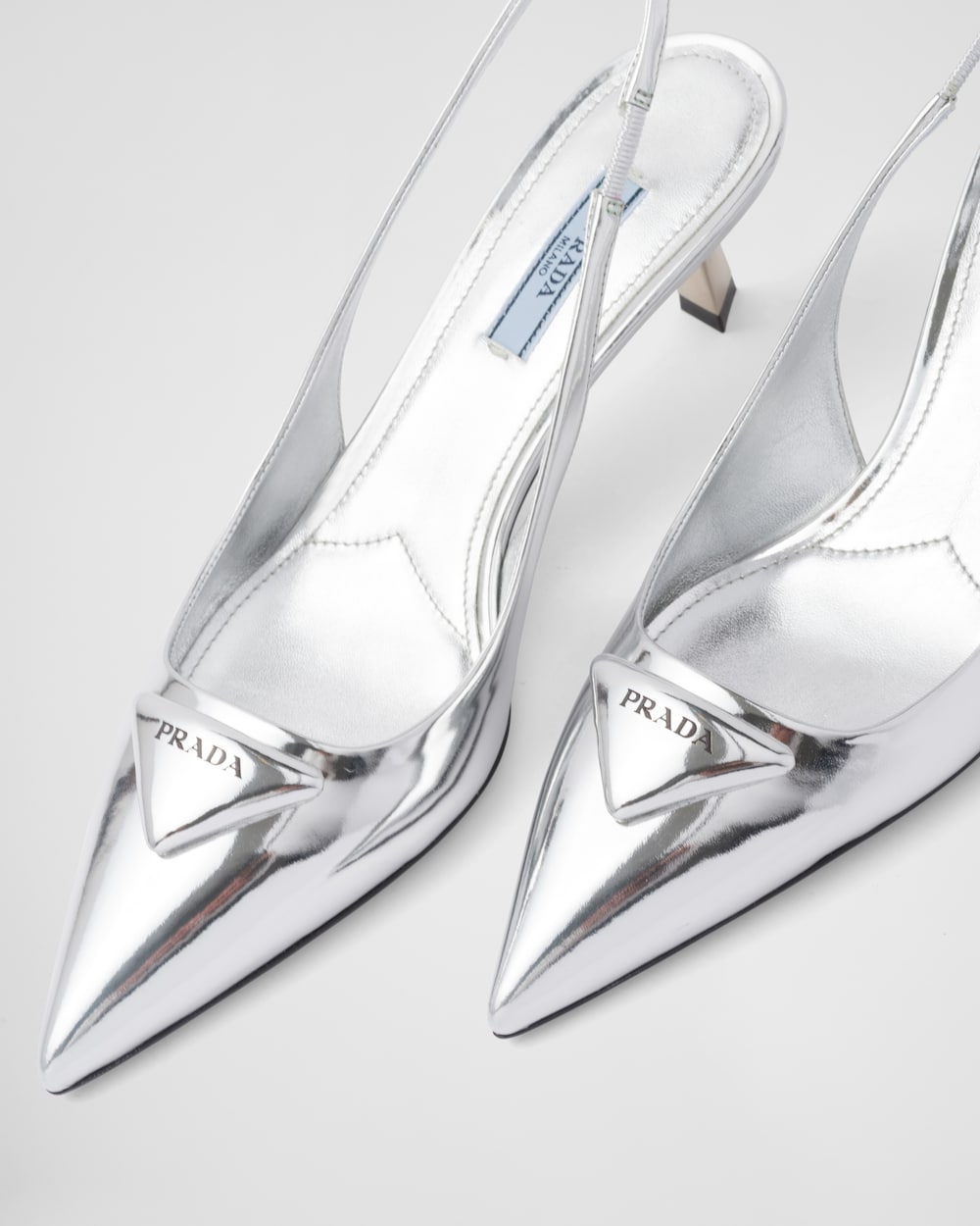 prada silver shoes Cinosural International School