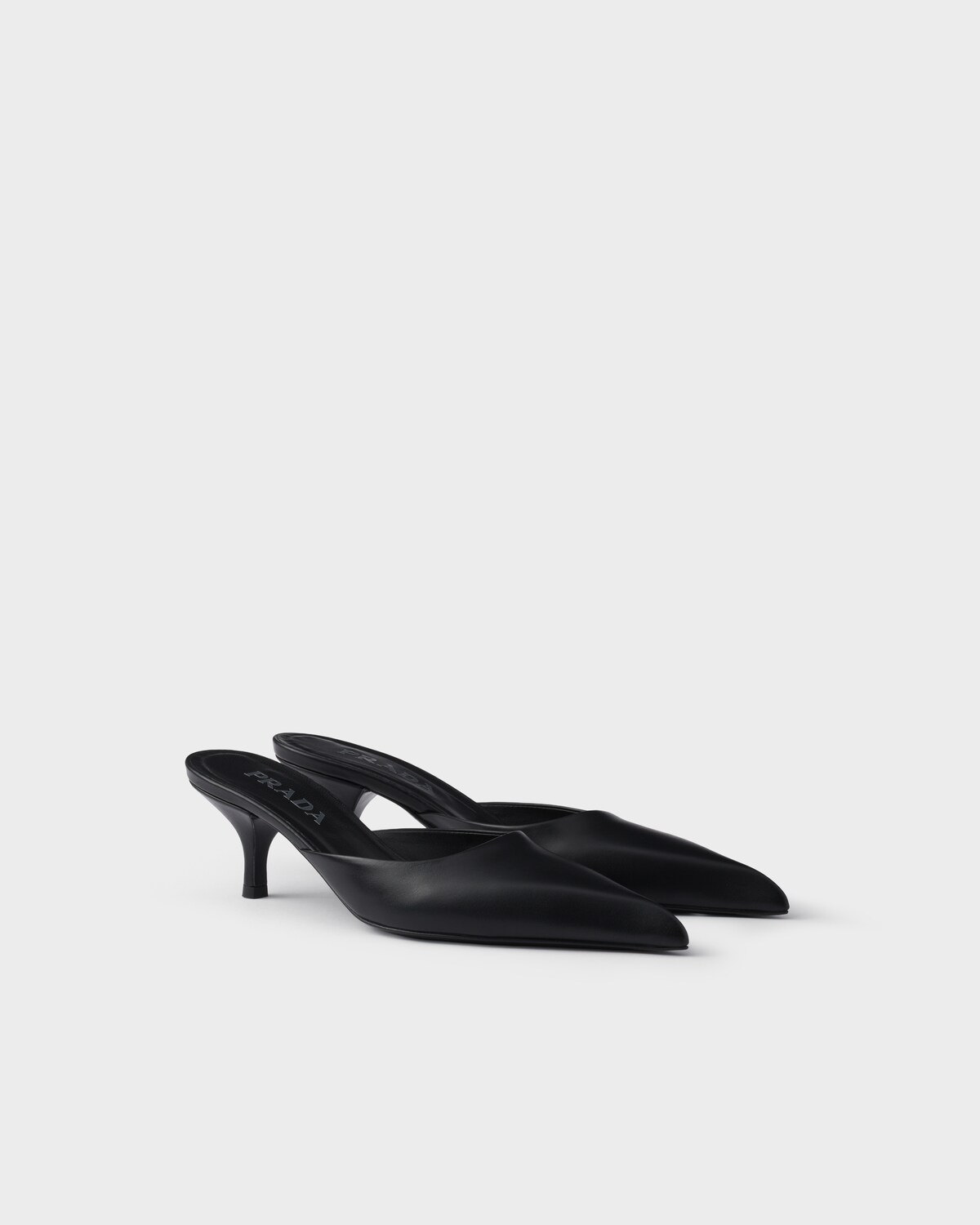 PRA CROSS MULE HEELS IN BLACK CALFSKIN WITH PADDED STRAPS