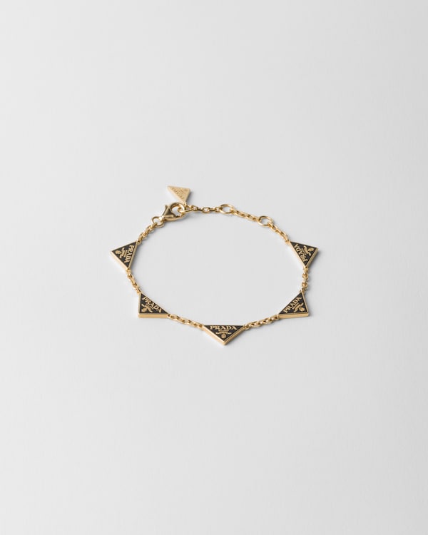 ワールド オンラインストア ゴールド メタル ピアス | PRADA アクセサリー