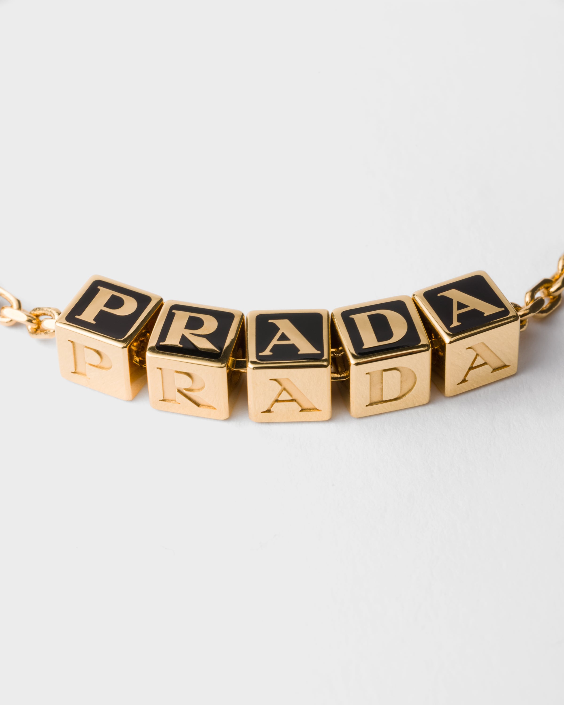 ゴールド/ブラック メタル ブレスレット | PRADA - 日本
