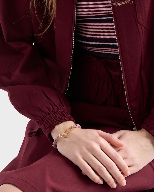 Braided nappa leather bracelet with metal ornament - Melocotón Braided nappa leather bracelet with metal ornament - Melocotón