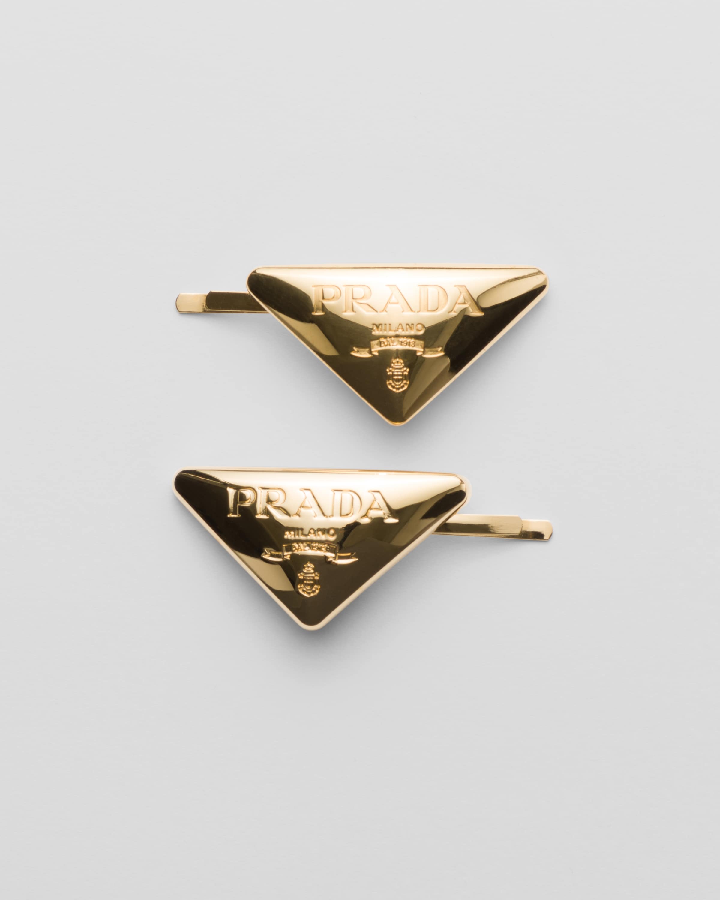 Gold Metal hair clips | Prada