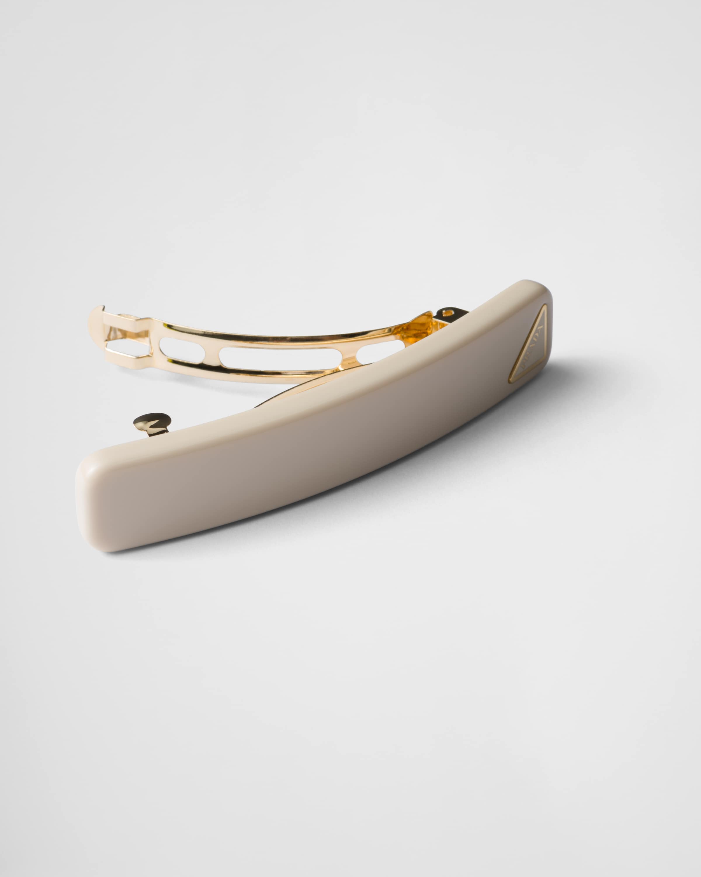Prada Womens Neutral Triangle-logo Plexiglas Hair Clip In Ivory