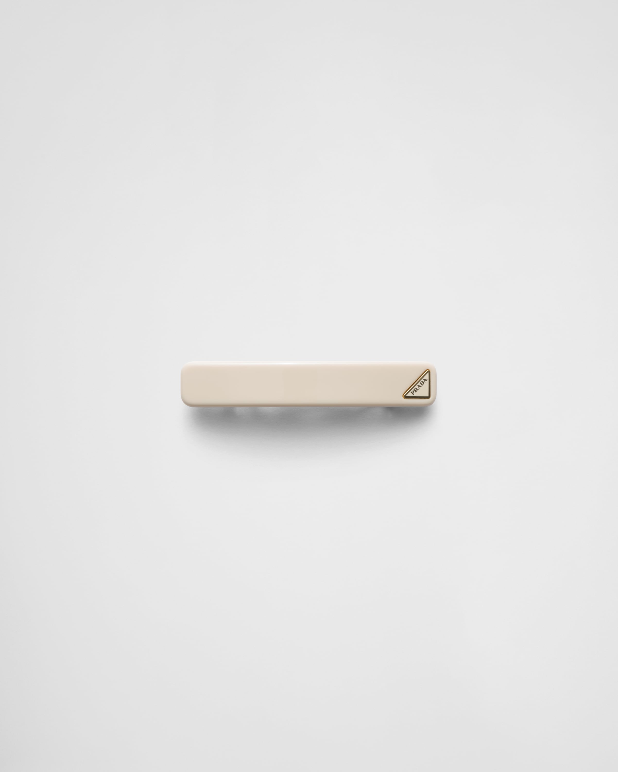 Prada Womens Neutral Triangle-logo Plexiglas Hair Clip In Ivory