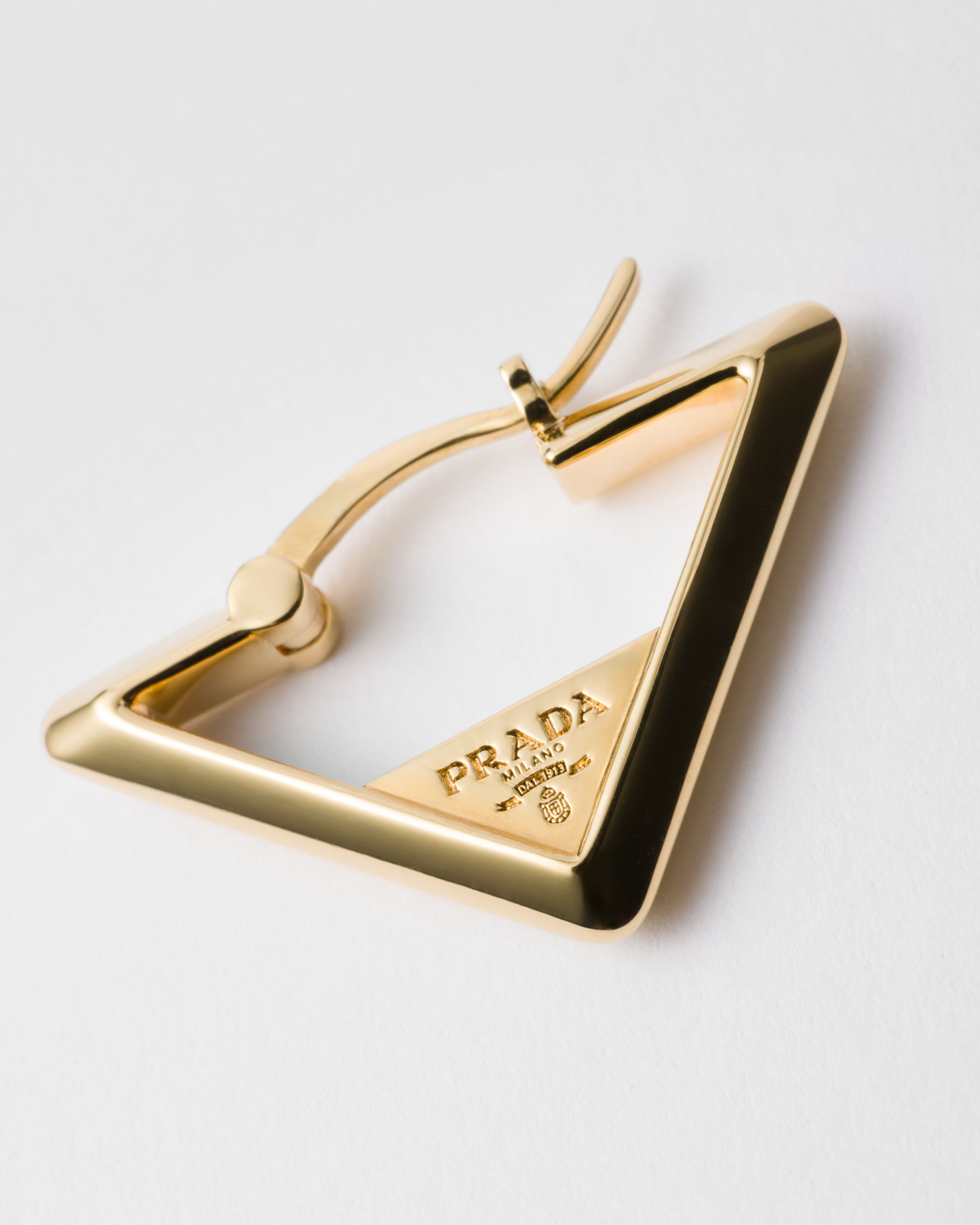 Prada Triangle Earrings In Gold