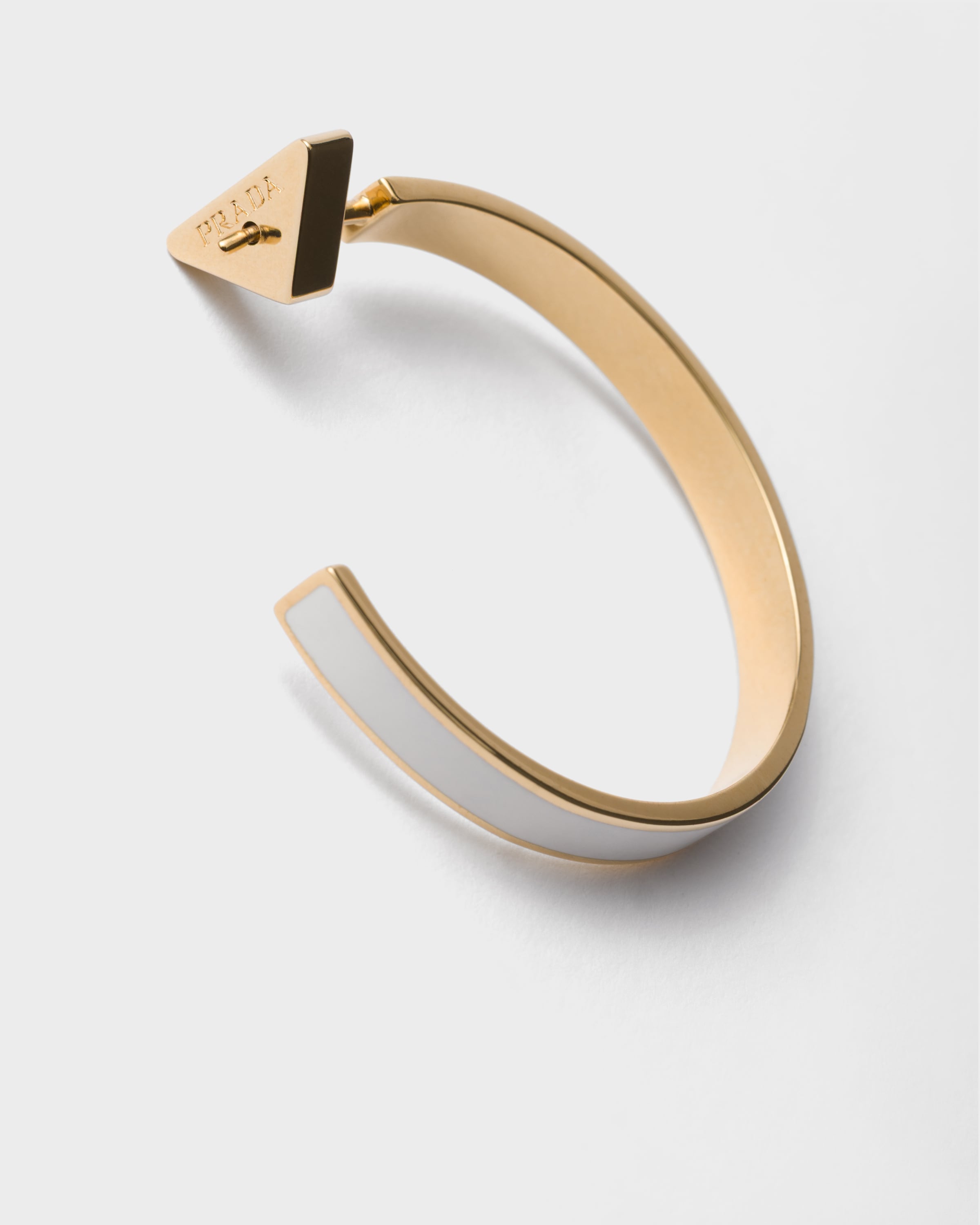 ホワイト＆ゴールド メタル ピアス | PRADA