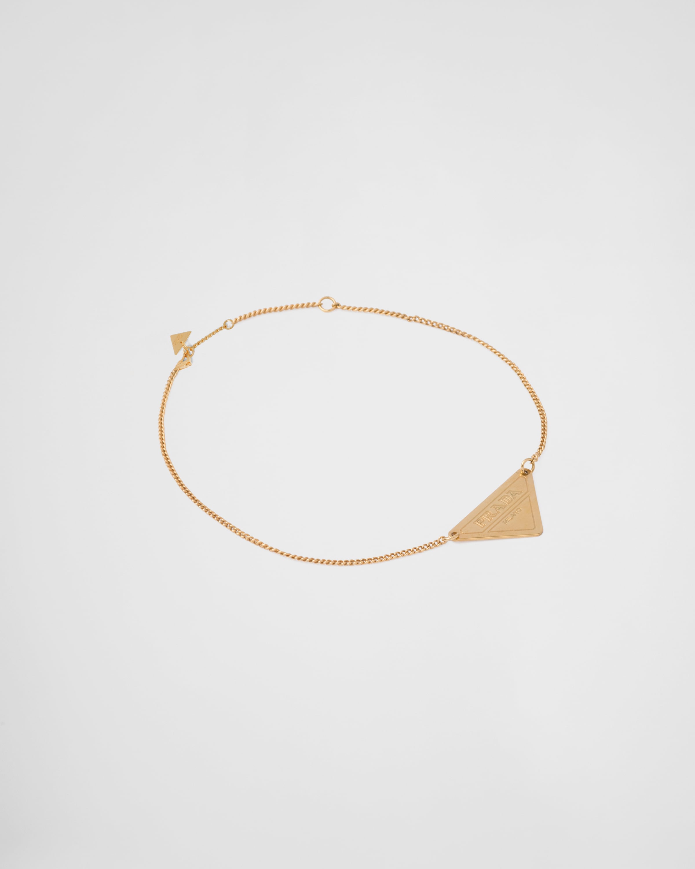 Prada gold best sale bracelet