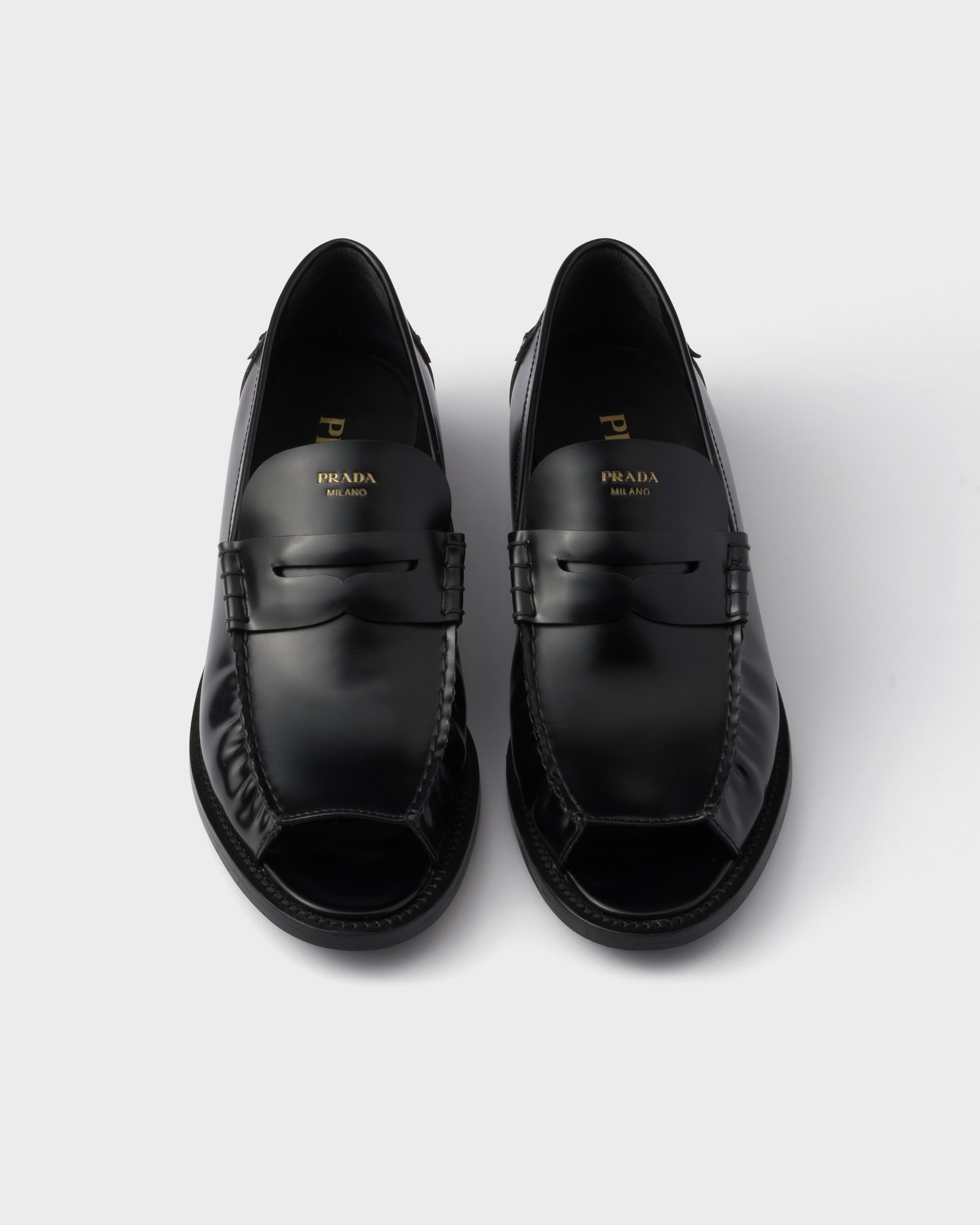 Prada Brushed Leather Peep-toe Loafers In Black