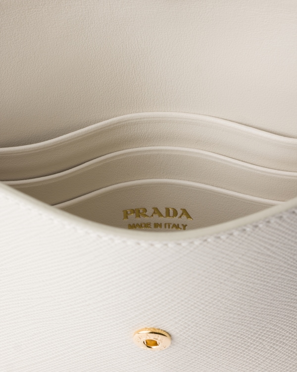 حقيبة كلاتش مثلثة من جلد سافيانو - أبيض طباشيري حقيبة كلاتش مثلثة من جلد سافيانو - أبيض طباشيري