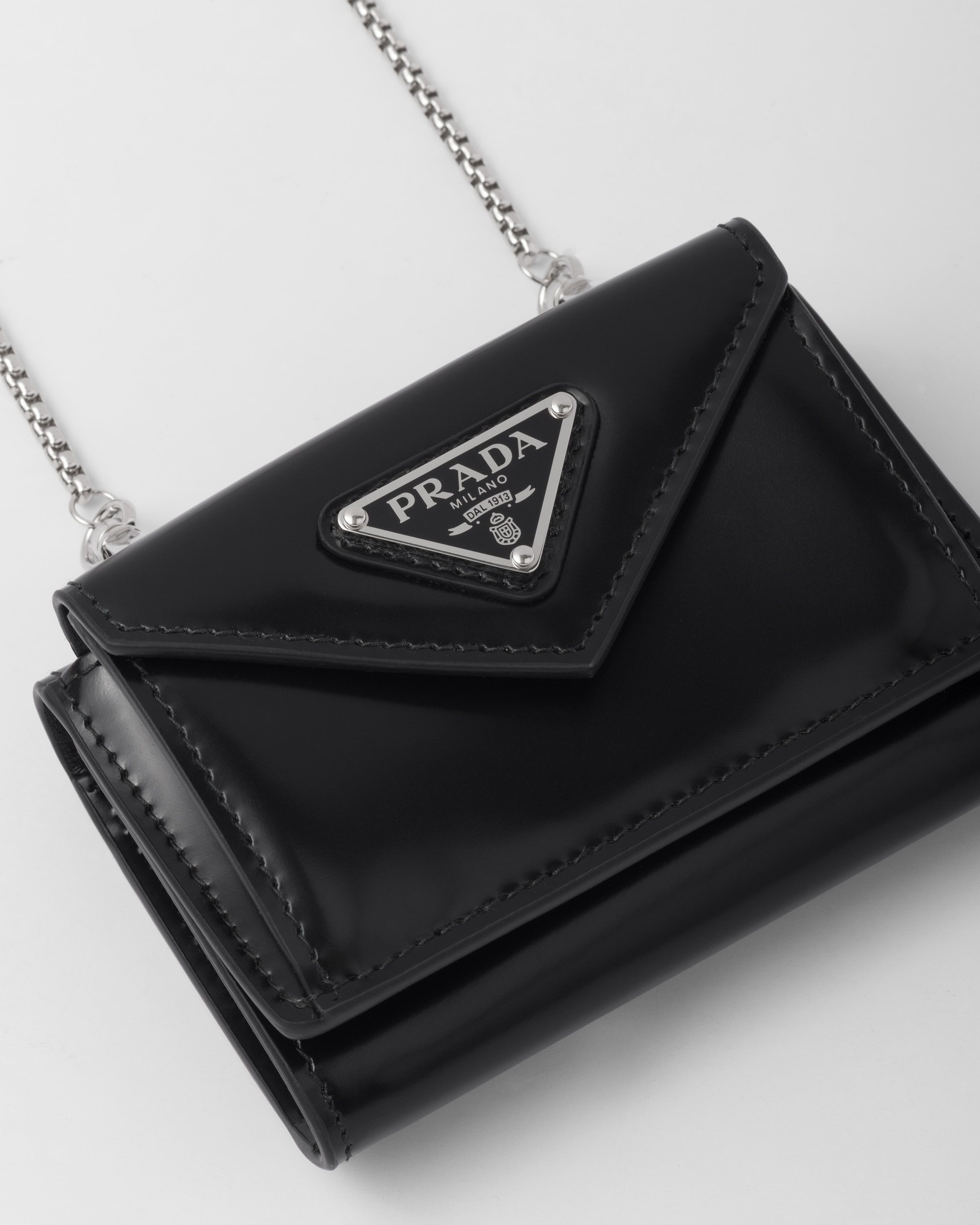Black Brushed leather card holder with shoulder strap Prada