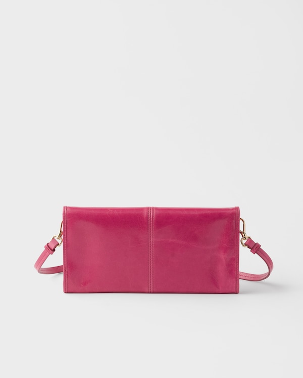 محفظة من الجلد بحزام كتف - زهري عود الريح محفظة من الجلد بحزام كتف - زهري عود الريح