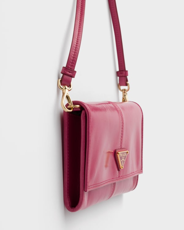 محفظة من الجلد بحزام كتف - زهري عود الريح محفظة من الجلد بحزام كتف - زهري عود الريح