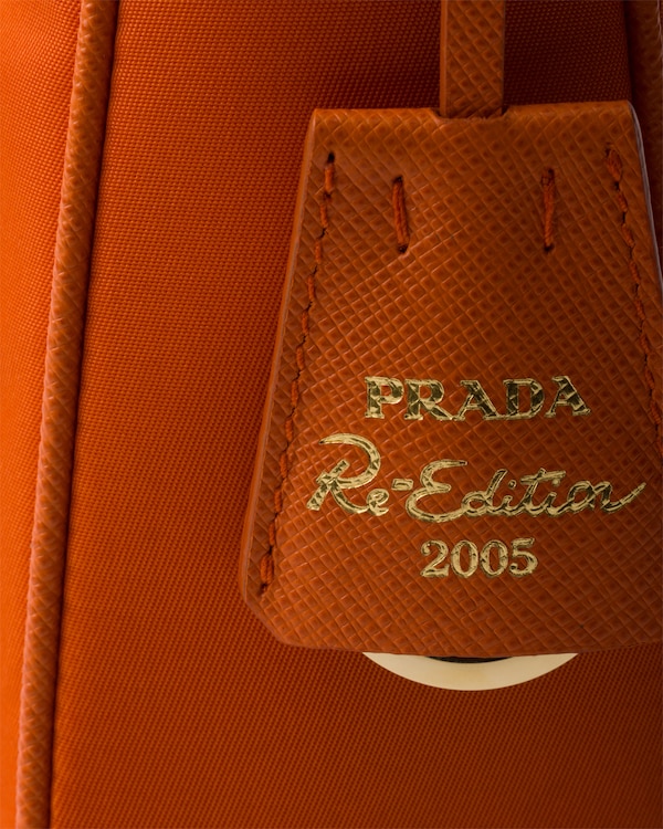 Prada Re-Edition 2005 Re-Nylon and Saffiano mini bag - Papaya Prada Re-Edition 2005 Re-Nylon and Saffiano mini bag - Papaya