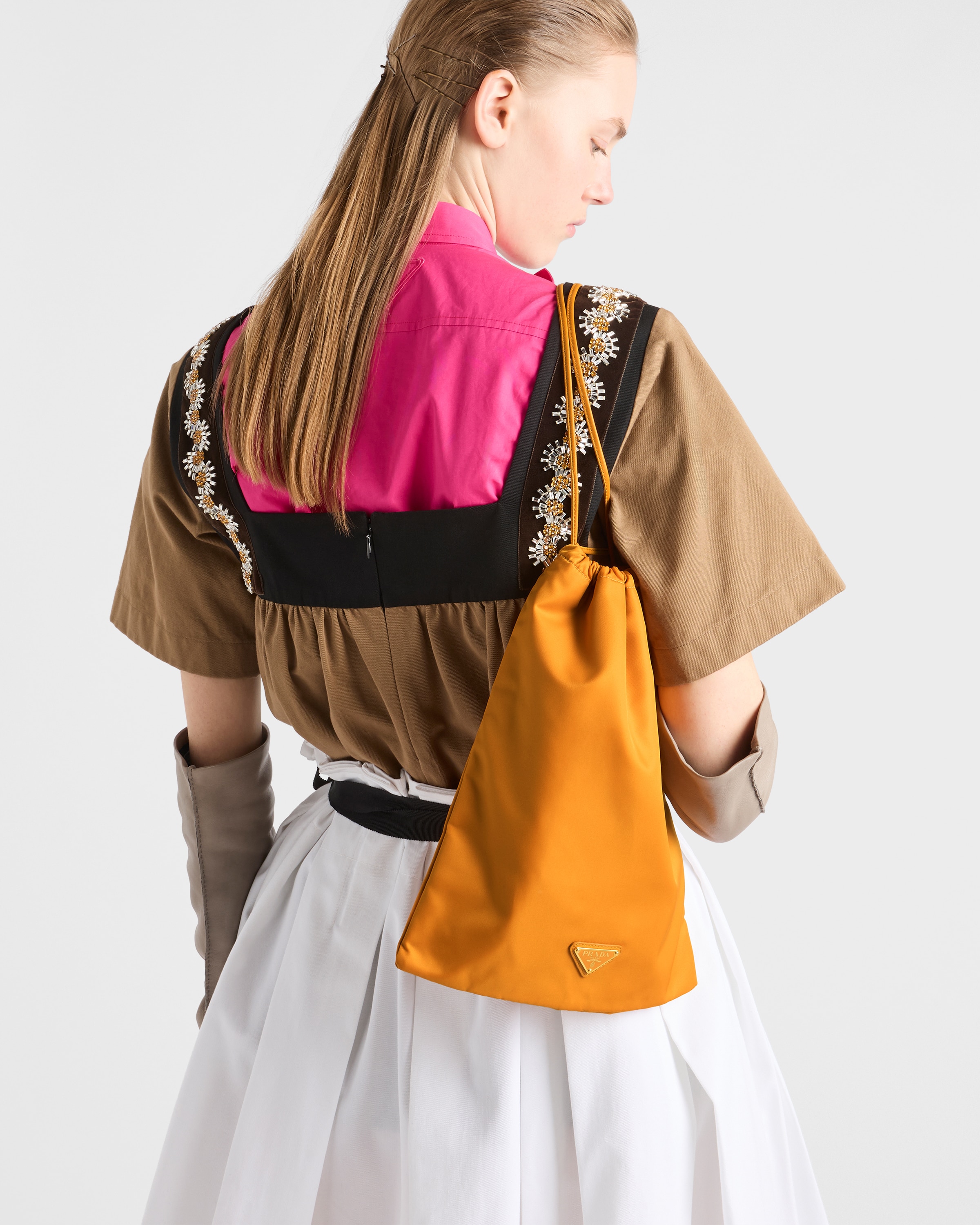 Prada Wish pouch worn by model