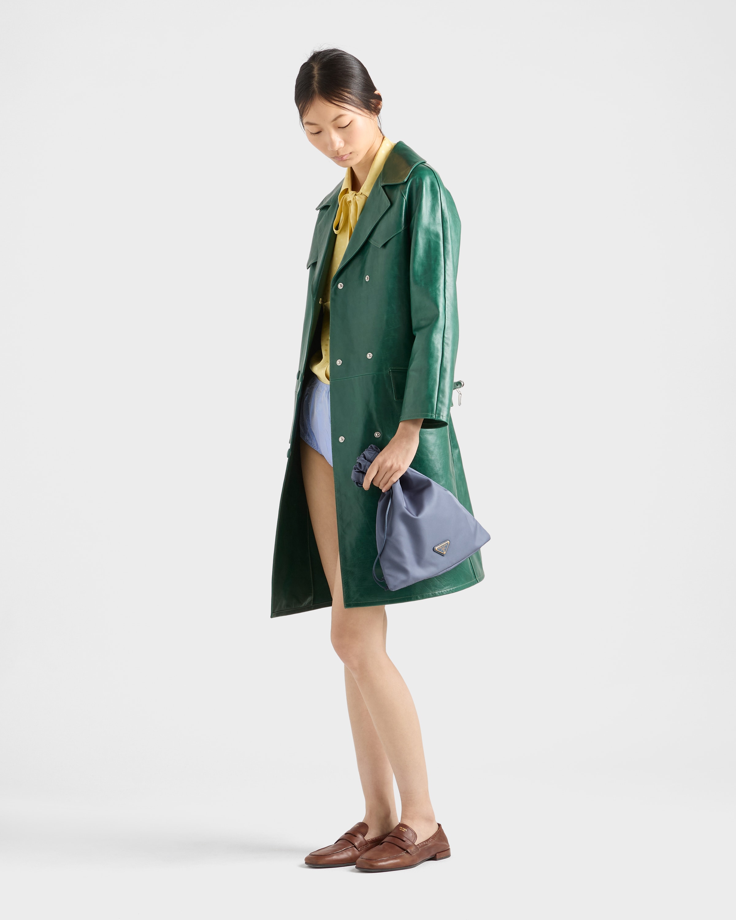 Blue Prada Wish pouch worn by model